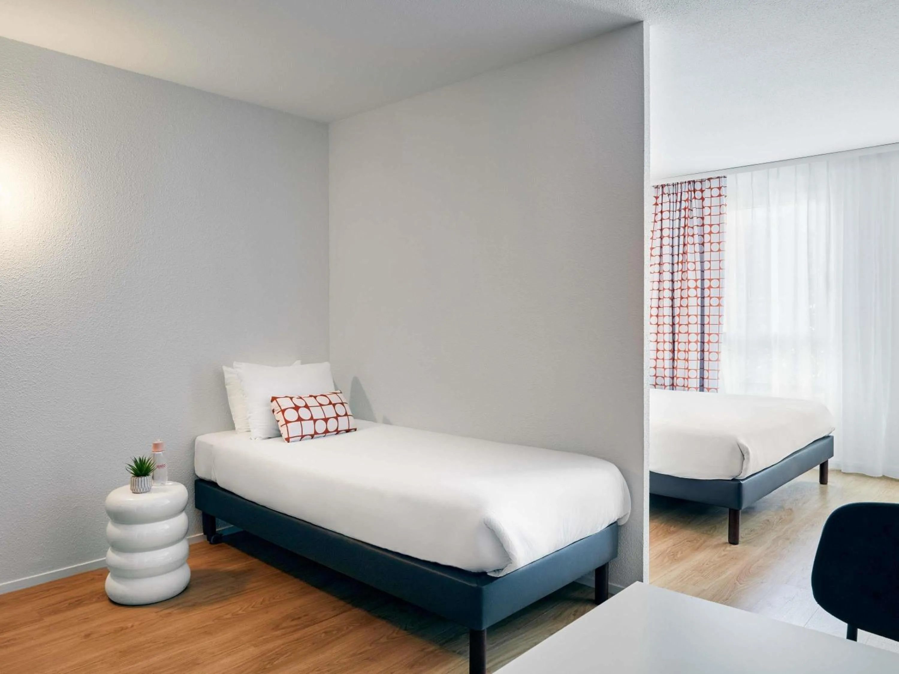 Bedroom, Bed in Aparthotel Adagio Access Paris Vanves - Porte de Versailles