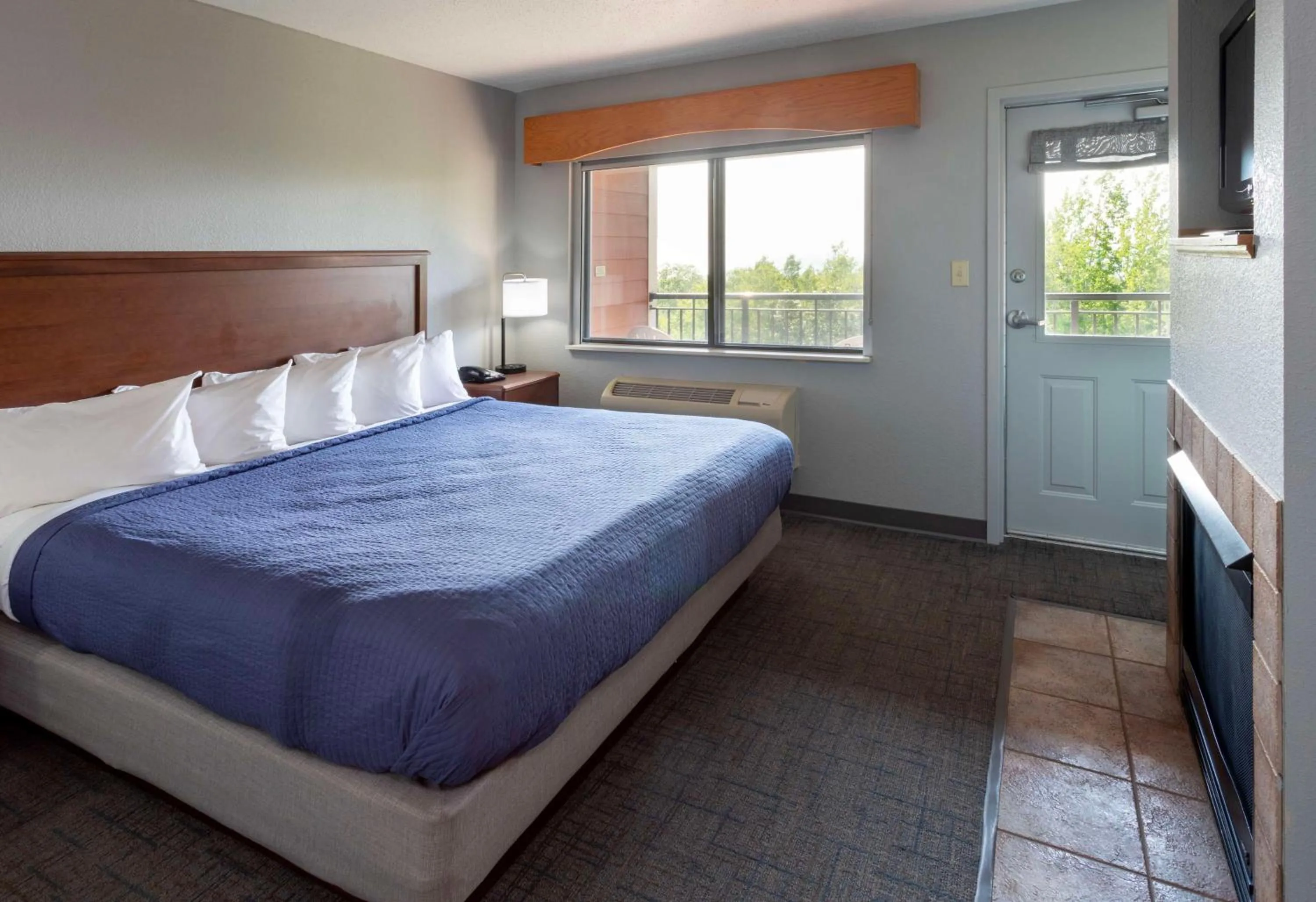 Bedroom, Bed in Black Beach Inn by GrandStay