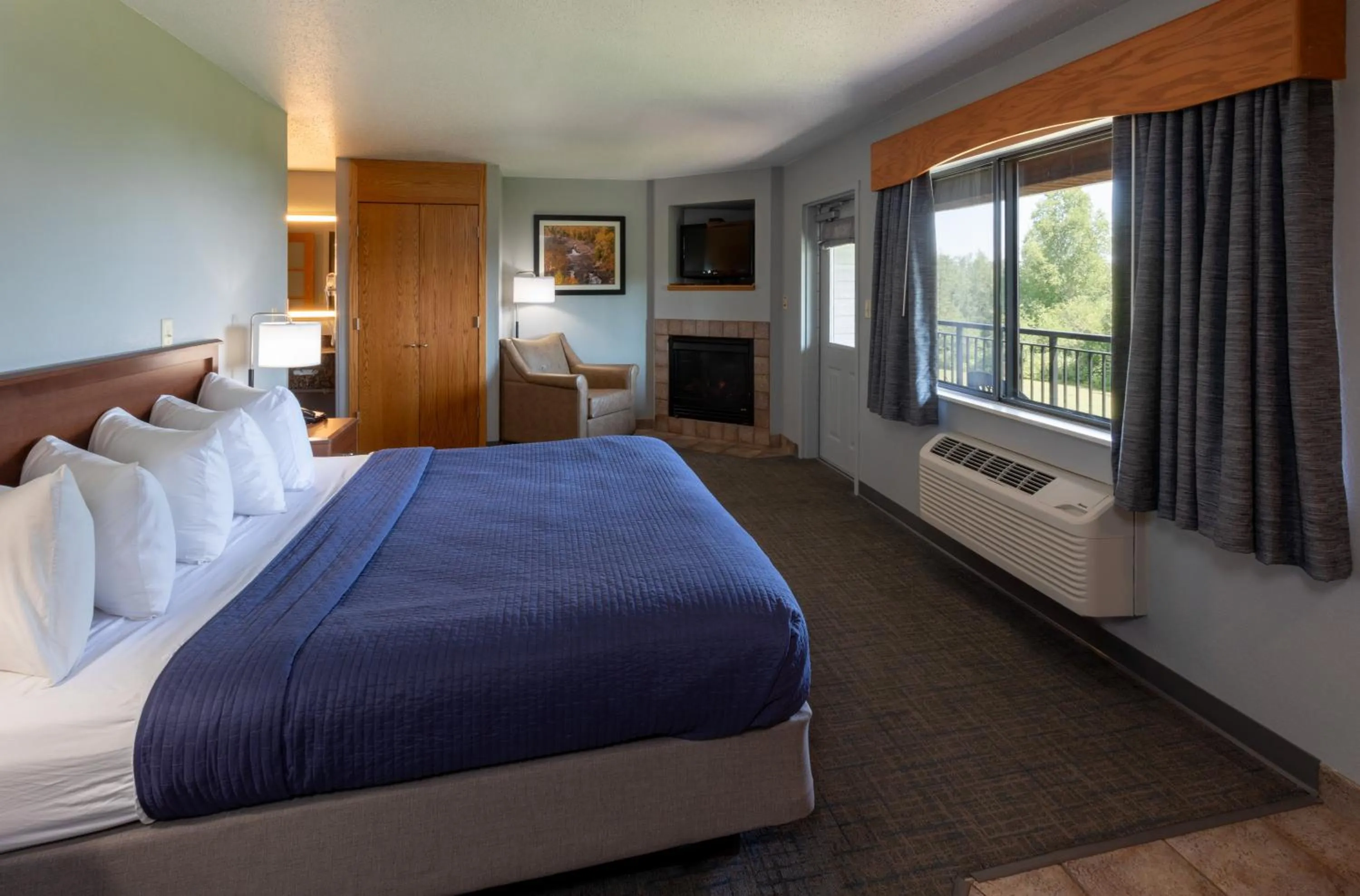 Bed in Black Beach Inn by GrandStay