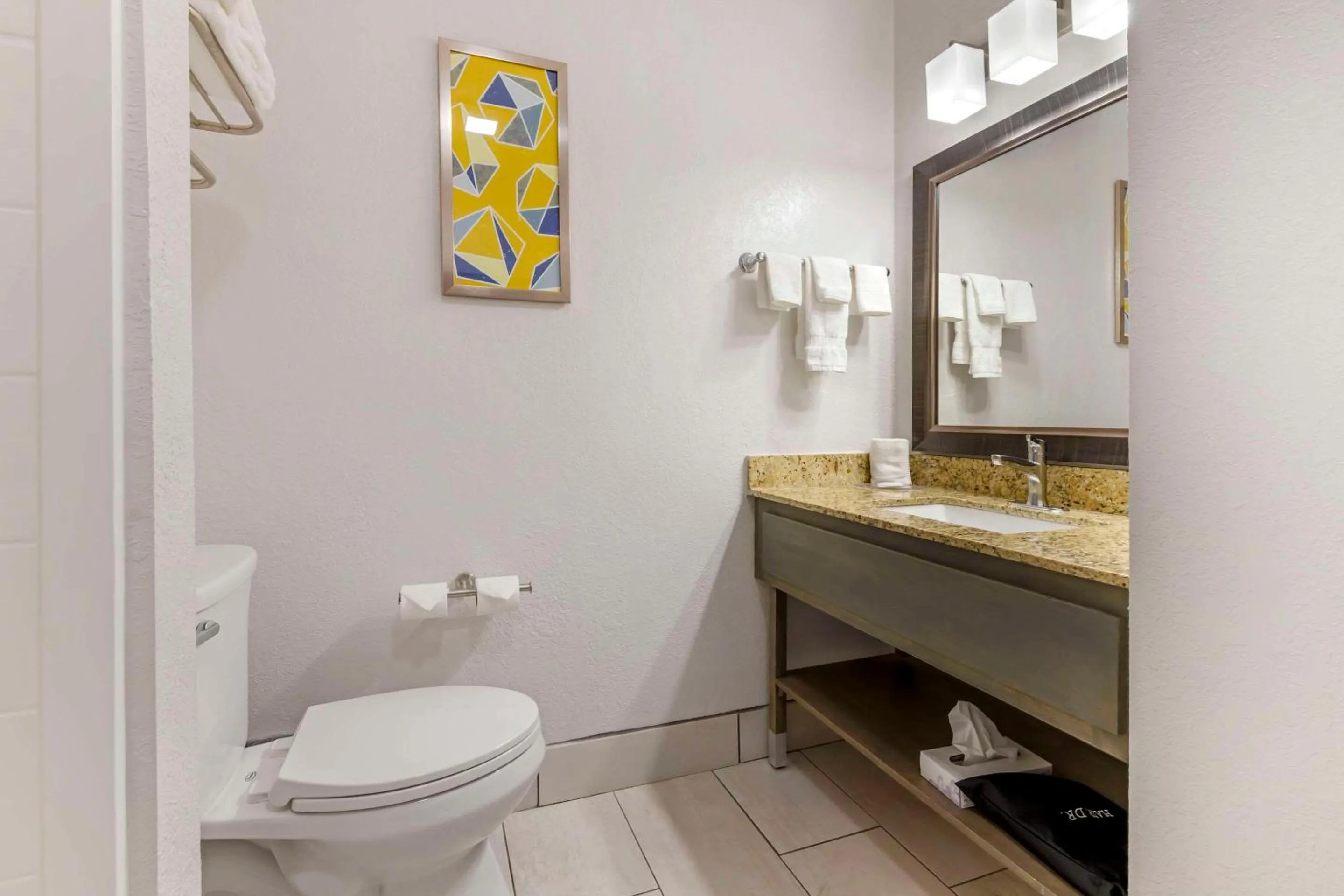 Bedroom in AmericInn by Wyndham New Lisbon