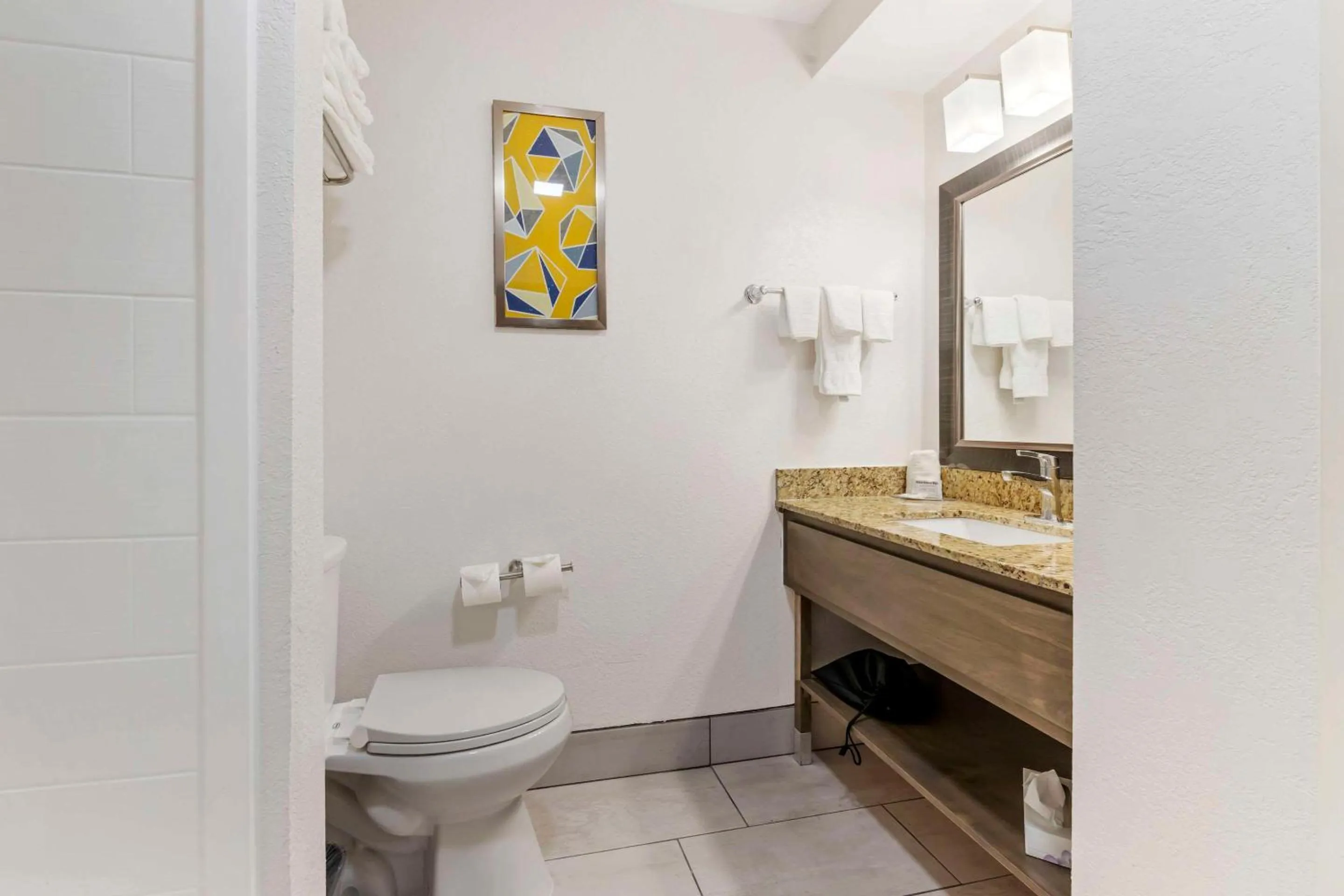 Bedroom in AmericInn by Wyndham New Lisbon