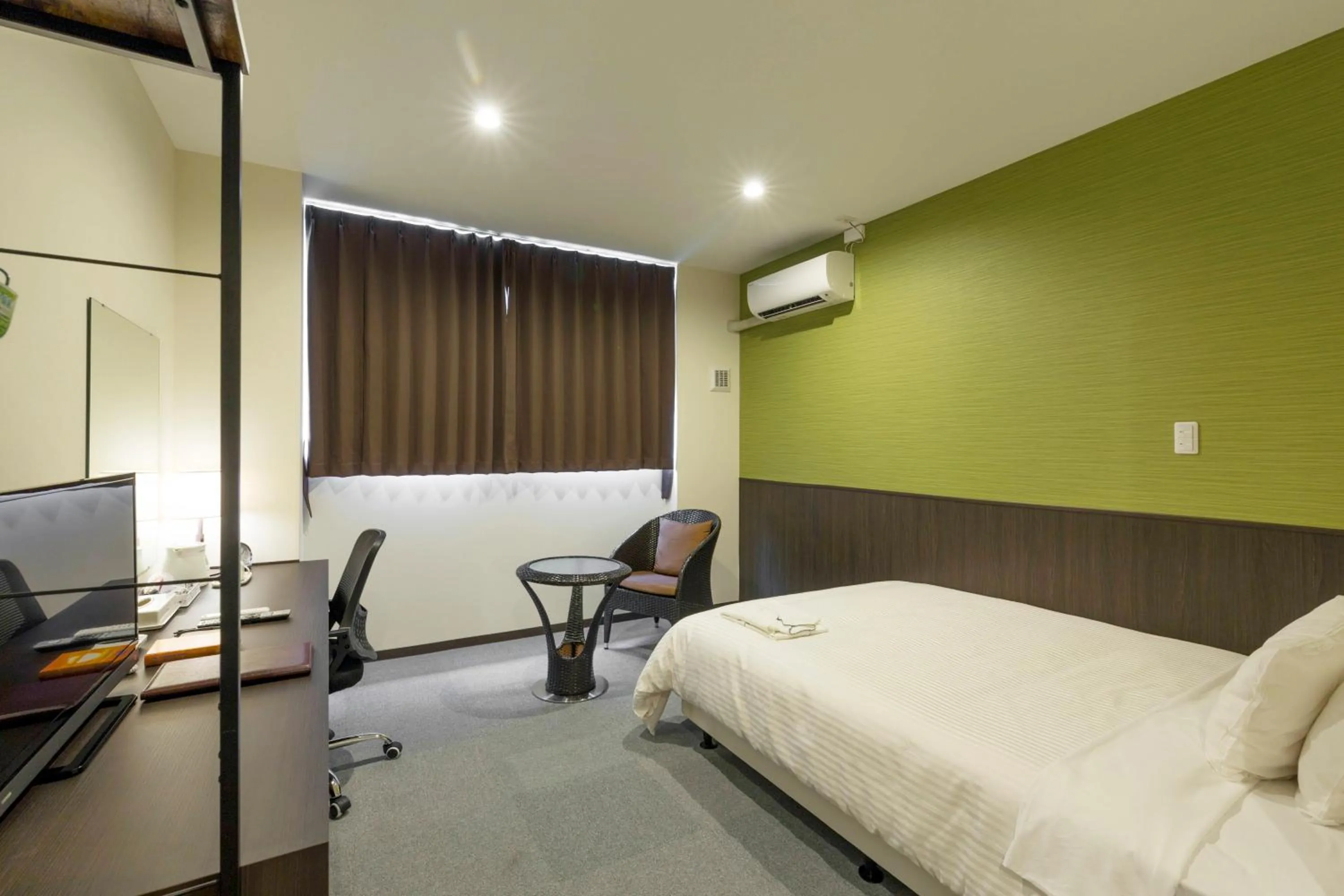 Photo of the whole room, Bed in Crown Hotel Okinawa Annex