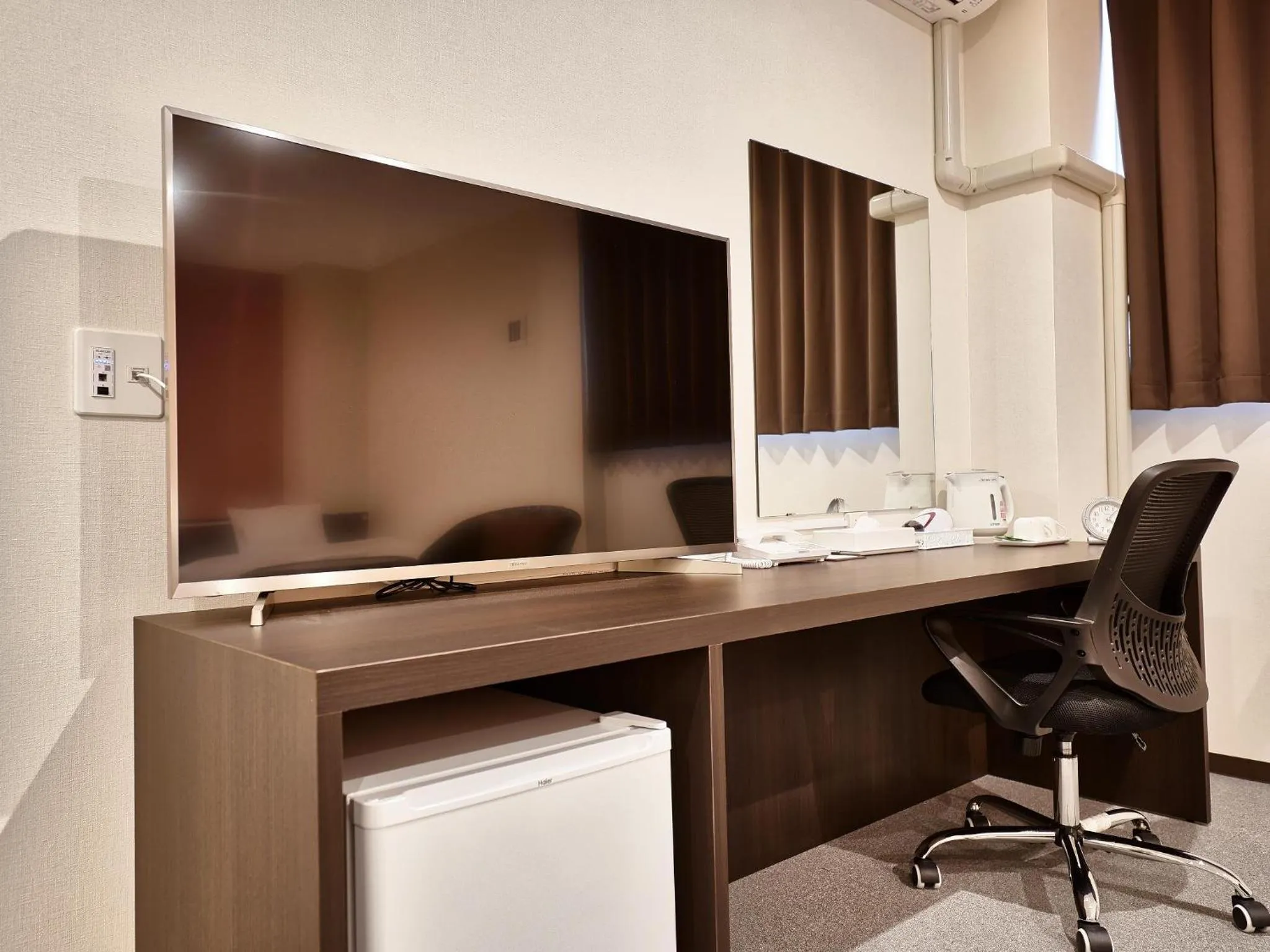 Living room in Crown Hotel Okinawa Annex