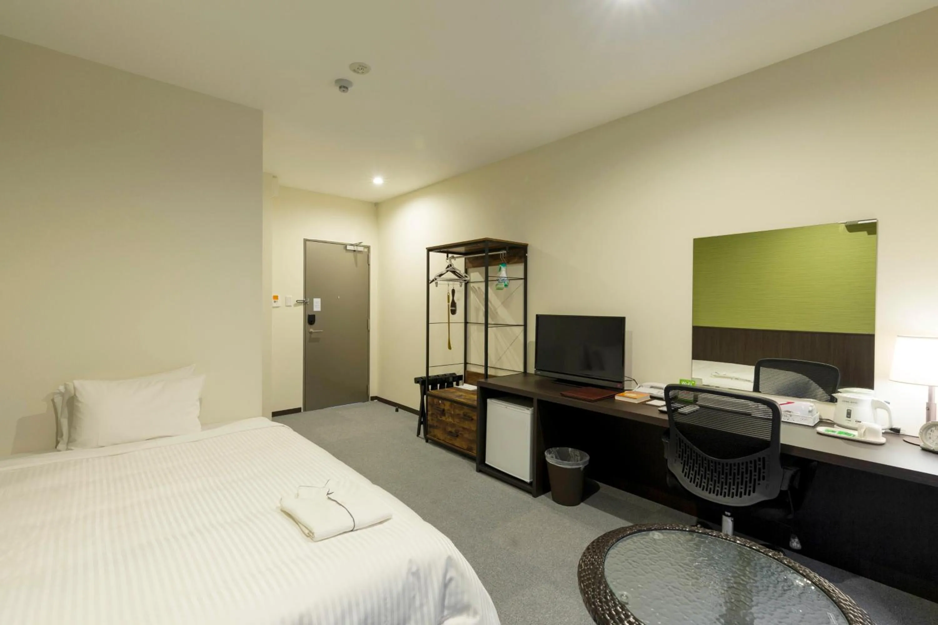 TV and multimedia, Bed in Crown Hotel Okinawa Annex