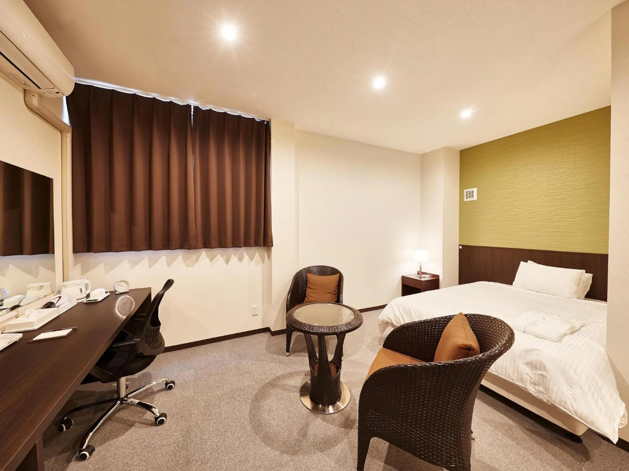 Bedroom, Bed in Crown Hotel Okinawa Annex