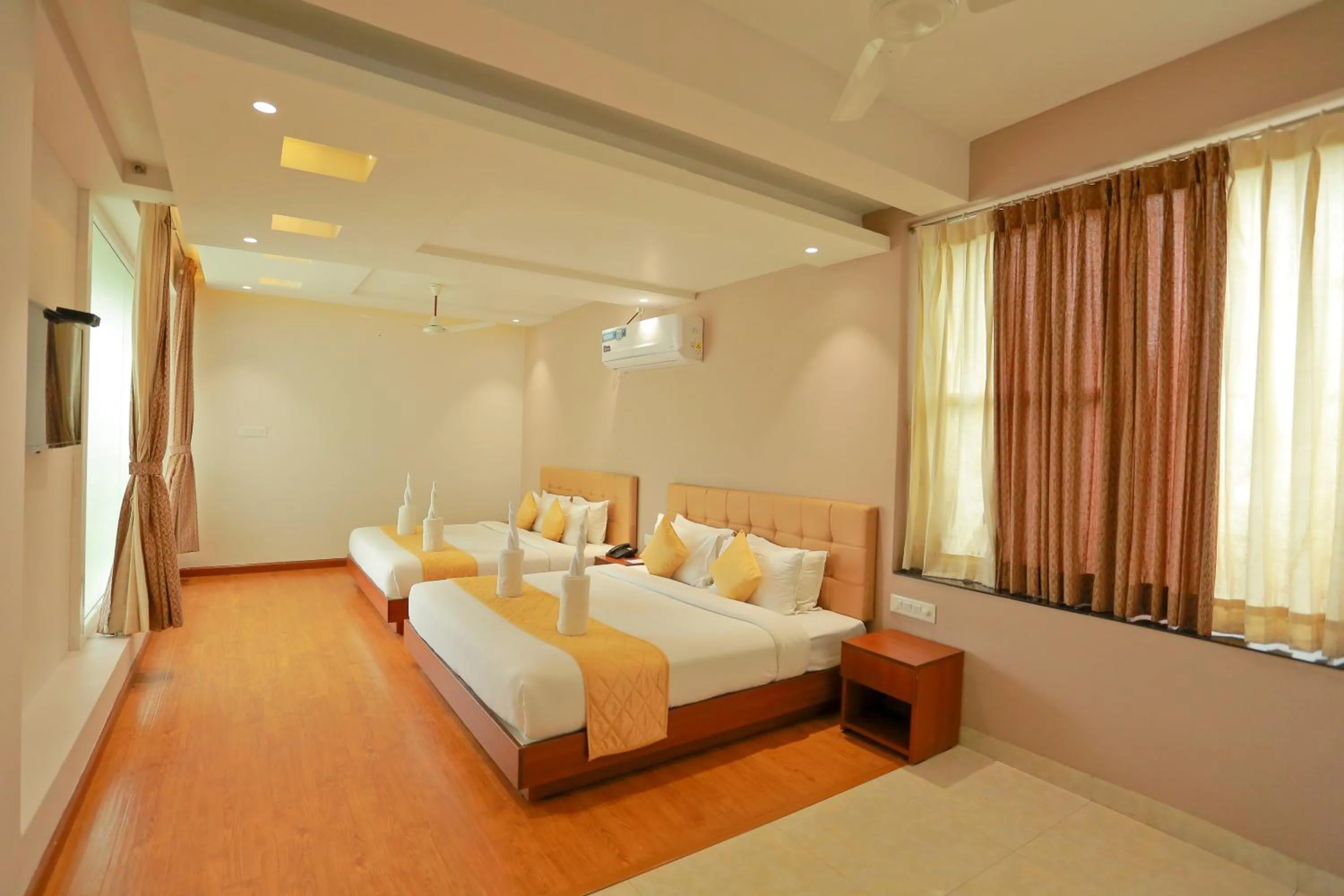 Bed in Grand Signature Hotel & spa