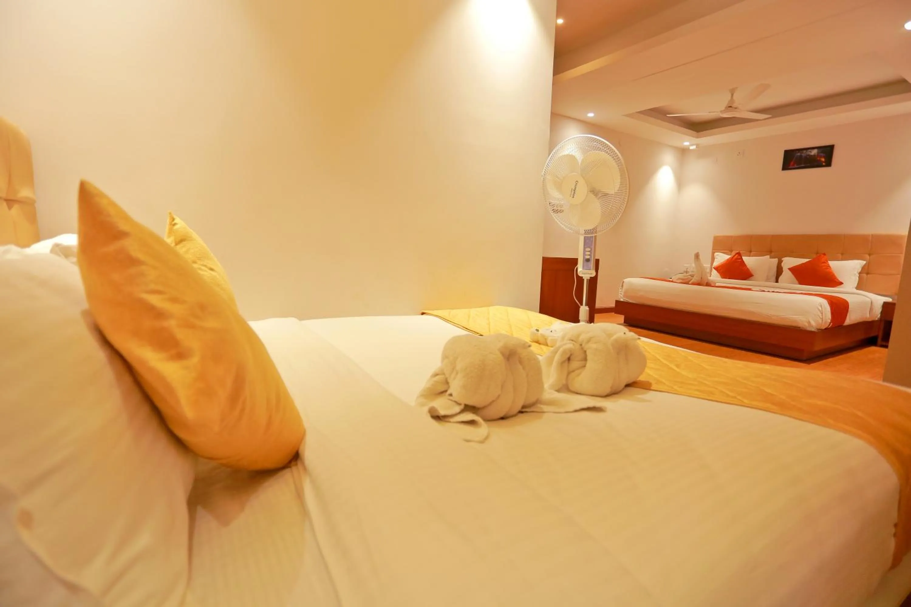 Bed in Grand Signature Hotel & spa