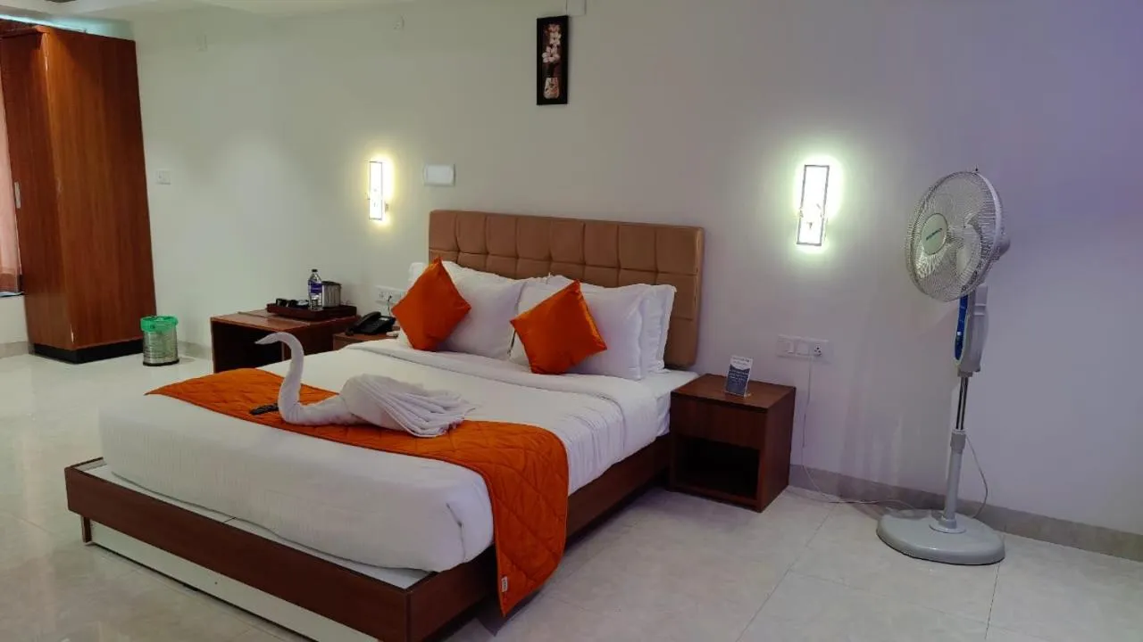Bed in Grand Signature Hotel & spa