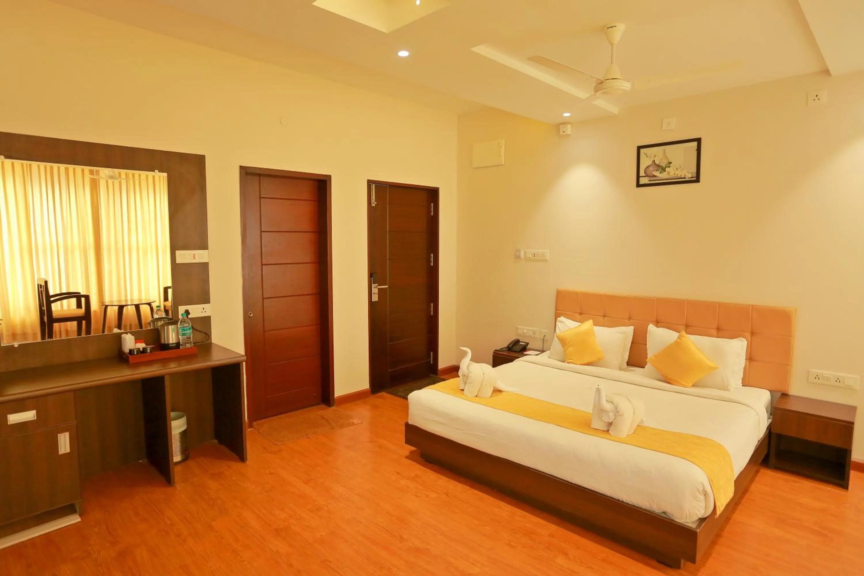 Bed in Grand Signature Hotel & spa