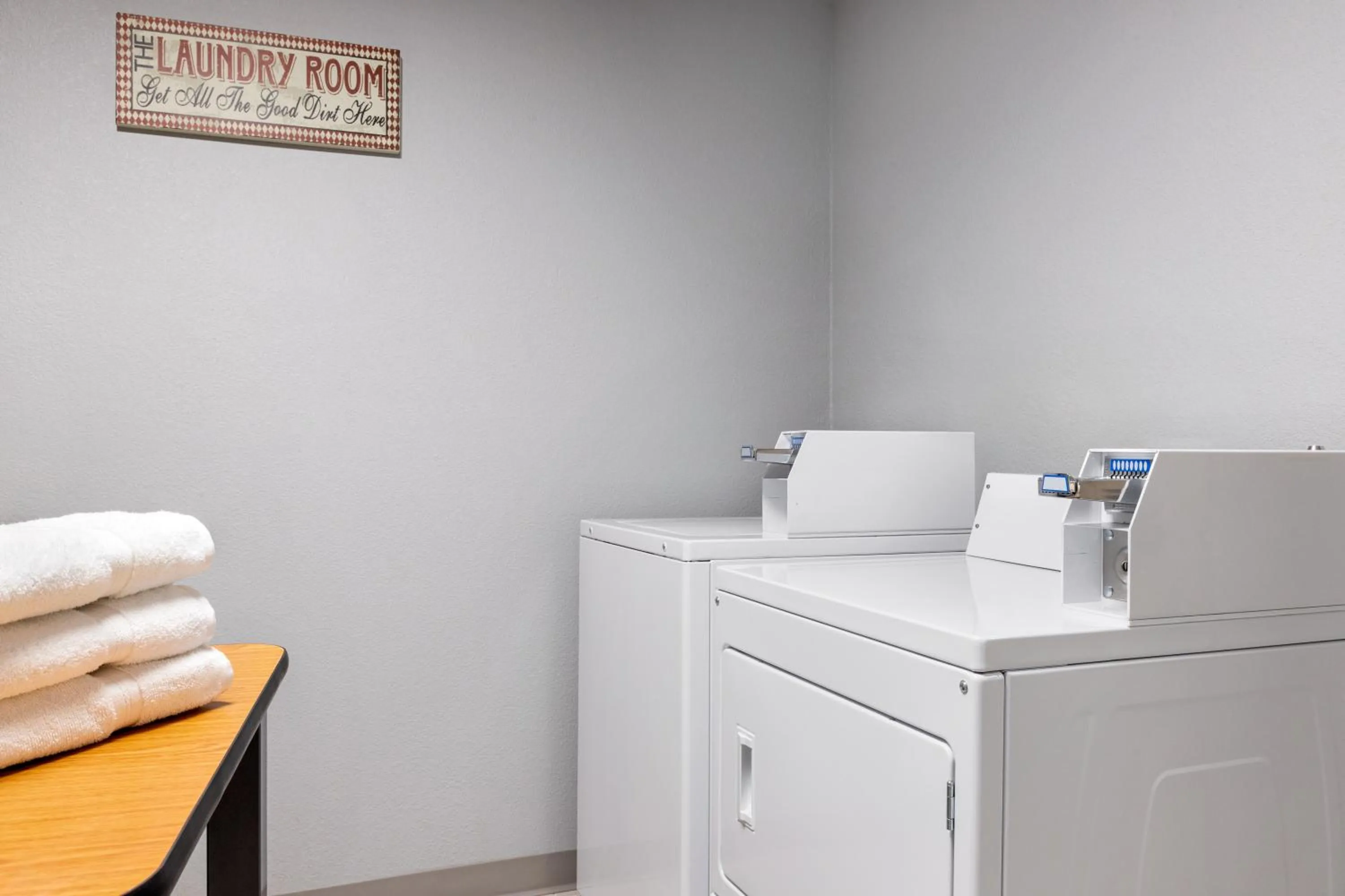 washing machine in AmericInn by Wyndham Williamsburg