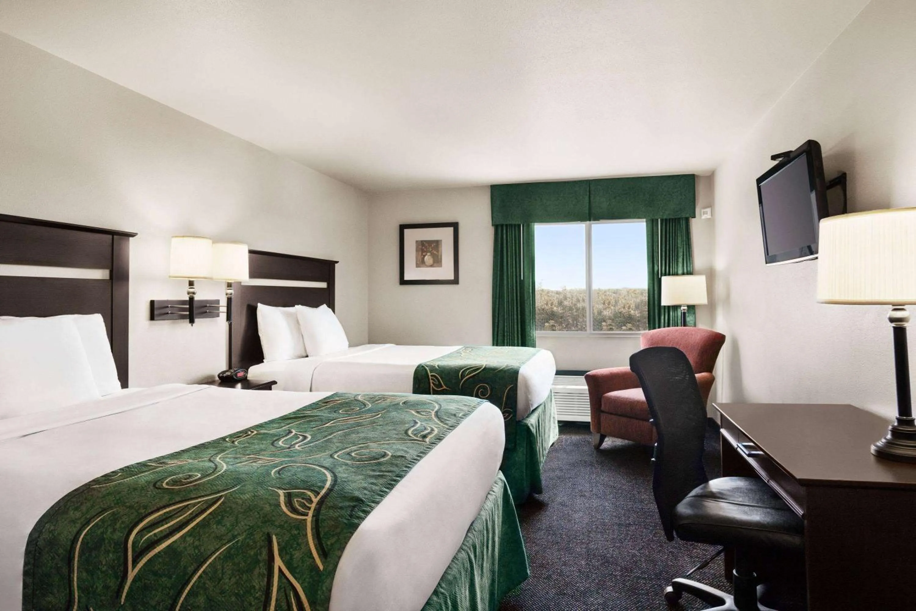 Photo of the whole room, Bed in Travelodge by Wyndham McAlester