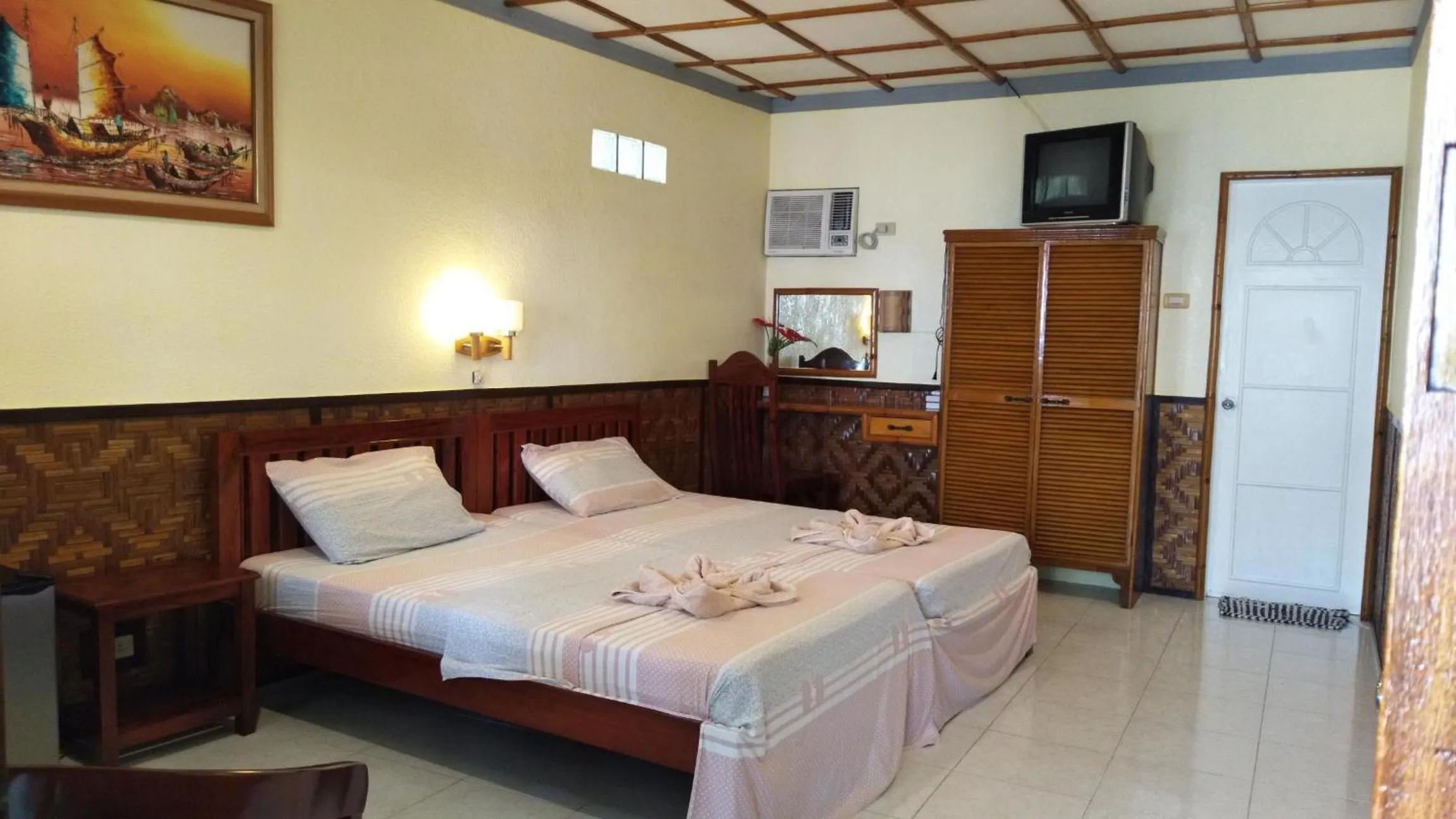 Bed in Love's Beach & Dive Resort