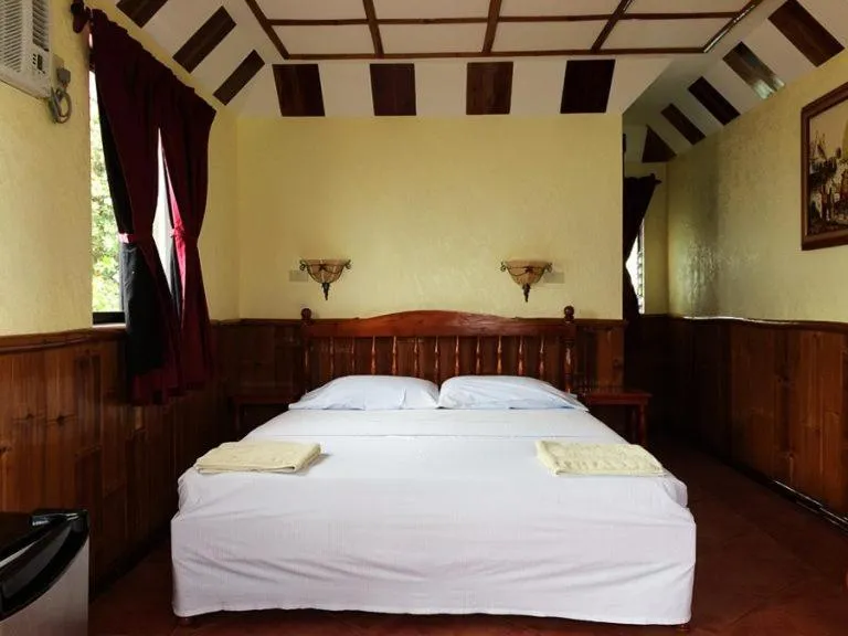 Bed in Love's Beach & Dive Resort