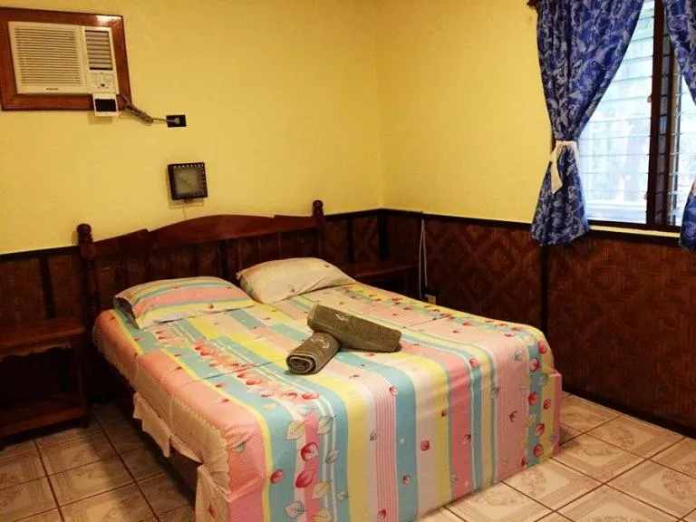 Bed in Love's Beach & Dive Resort