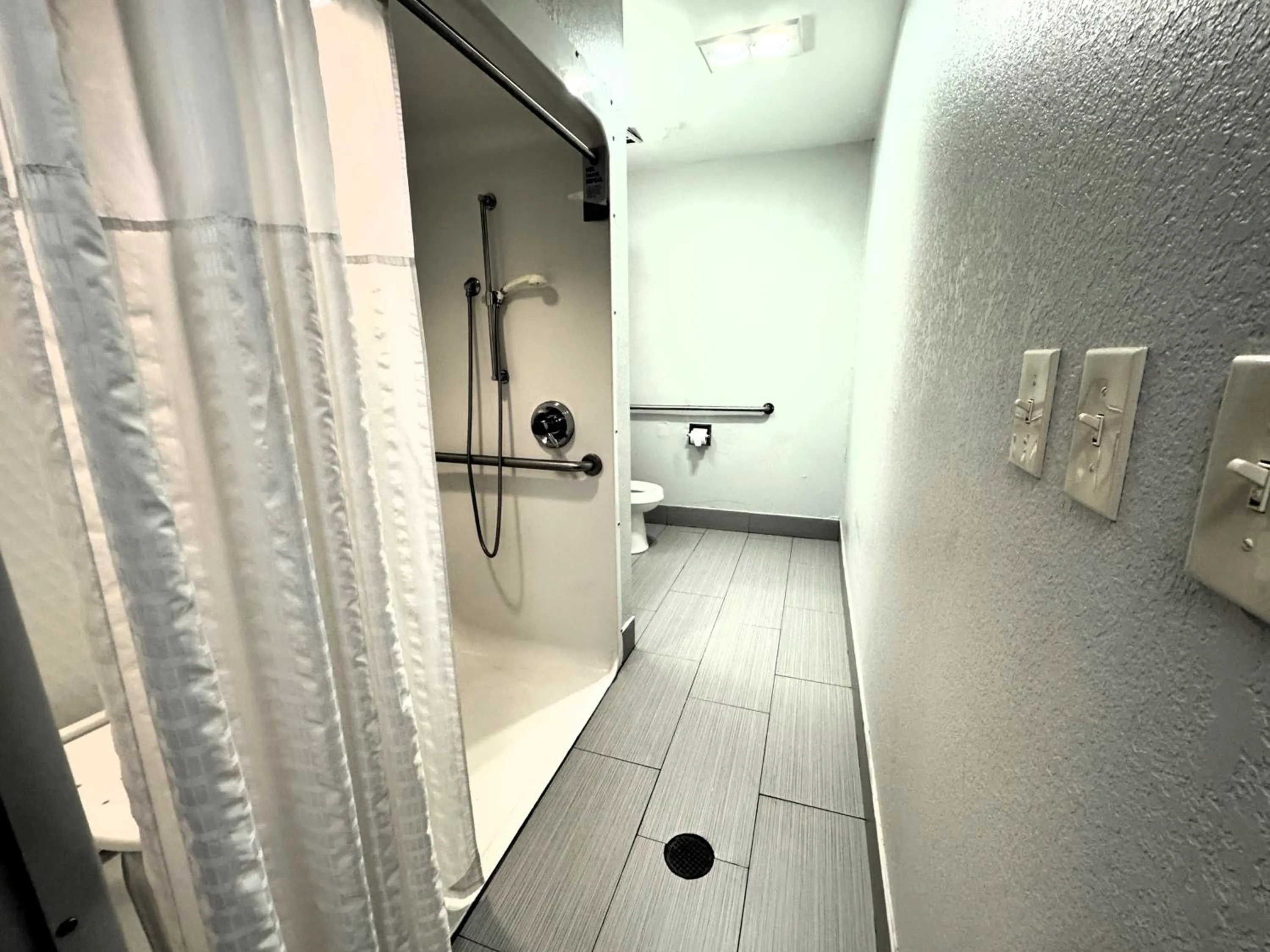 Bathroom in Microtel Inn & Suites by Wyndham Tuscaloosa East