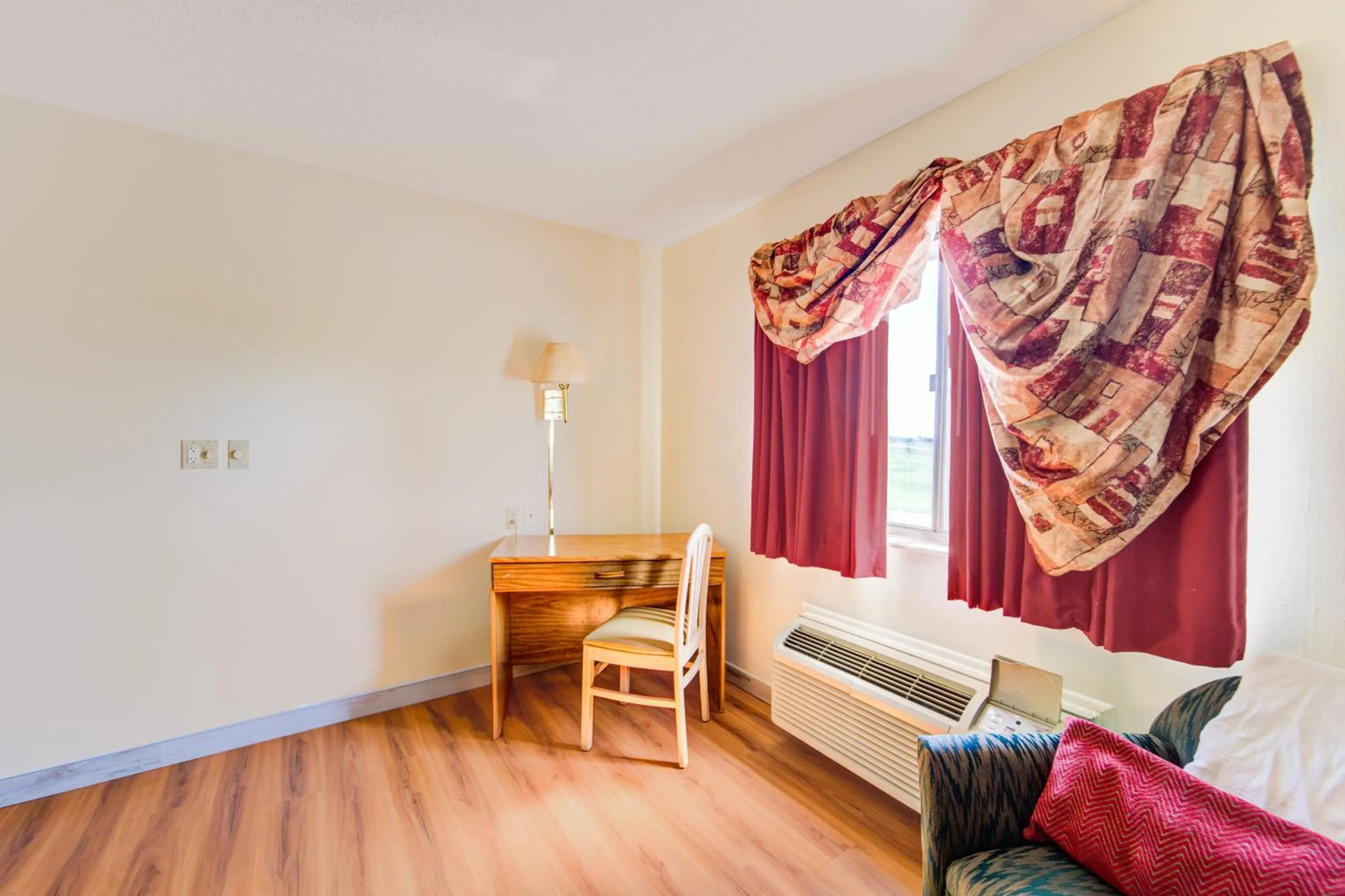 Bedroom in Capital O Amerihost Inn and Suites Mexico Hwy 54 MO