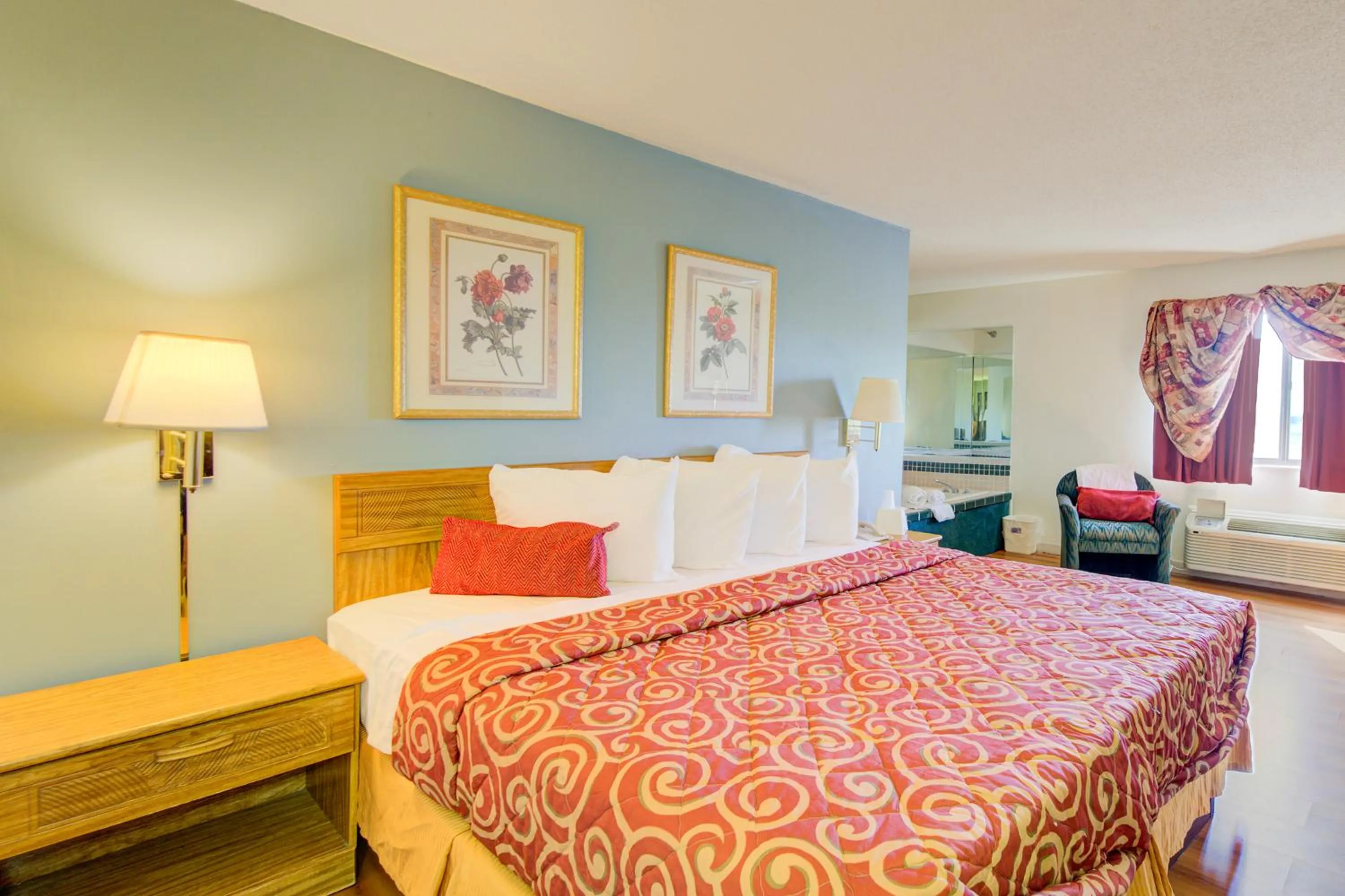 Bedroom, Bed in Capital O Amerihost Inn and Suites Mexico Hwy 54 MO