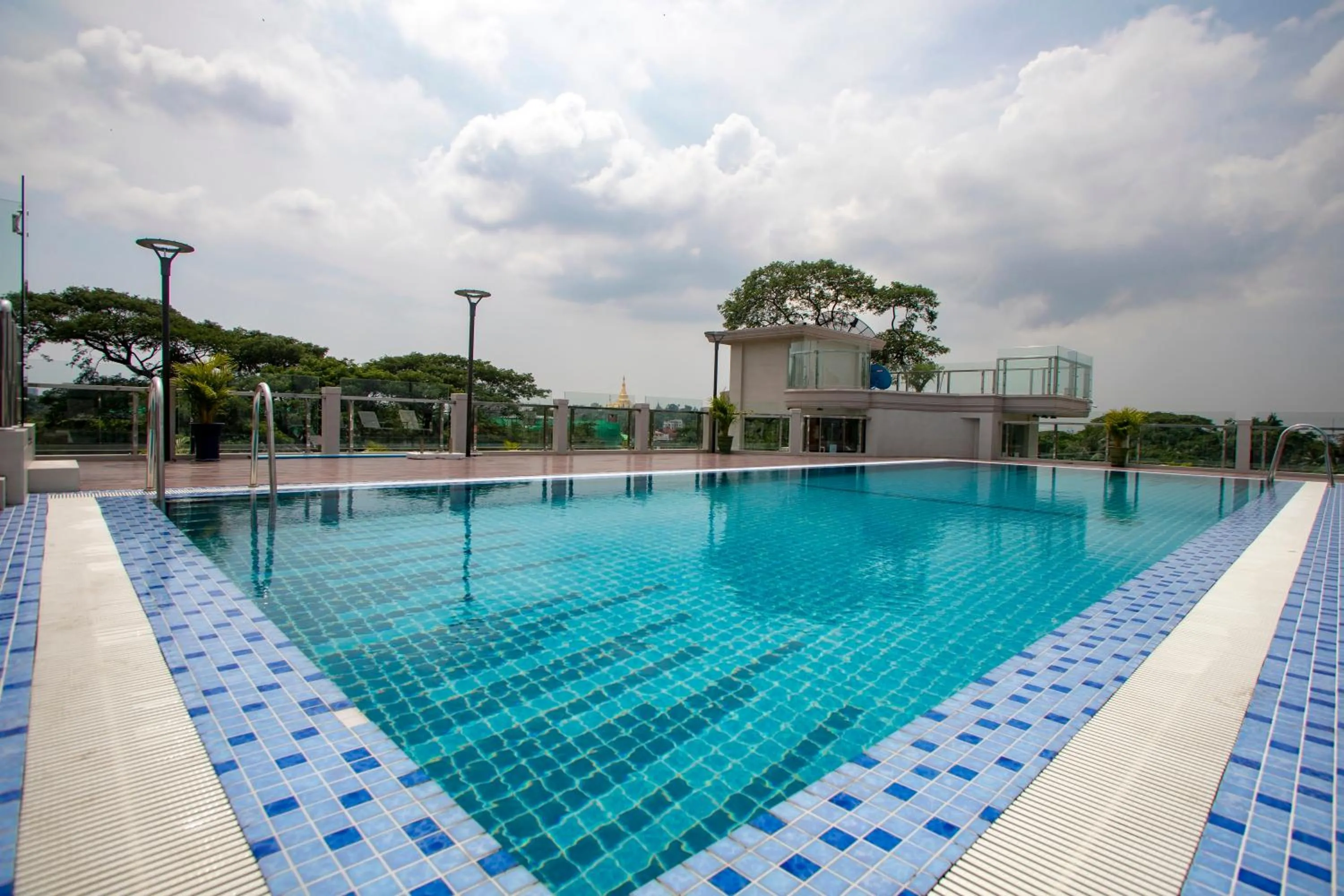 Swimming pool in Prestige Residences at Golden Valley by Grand United Hospitality