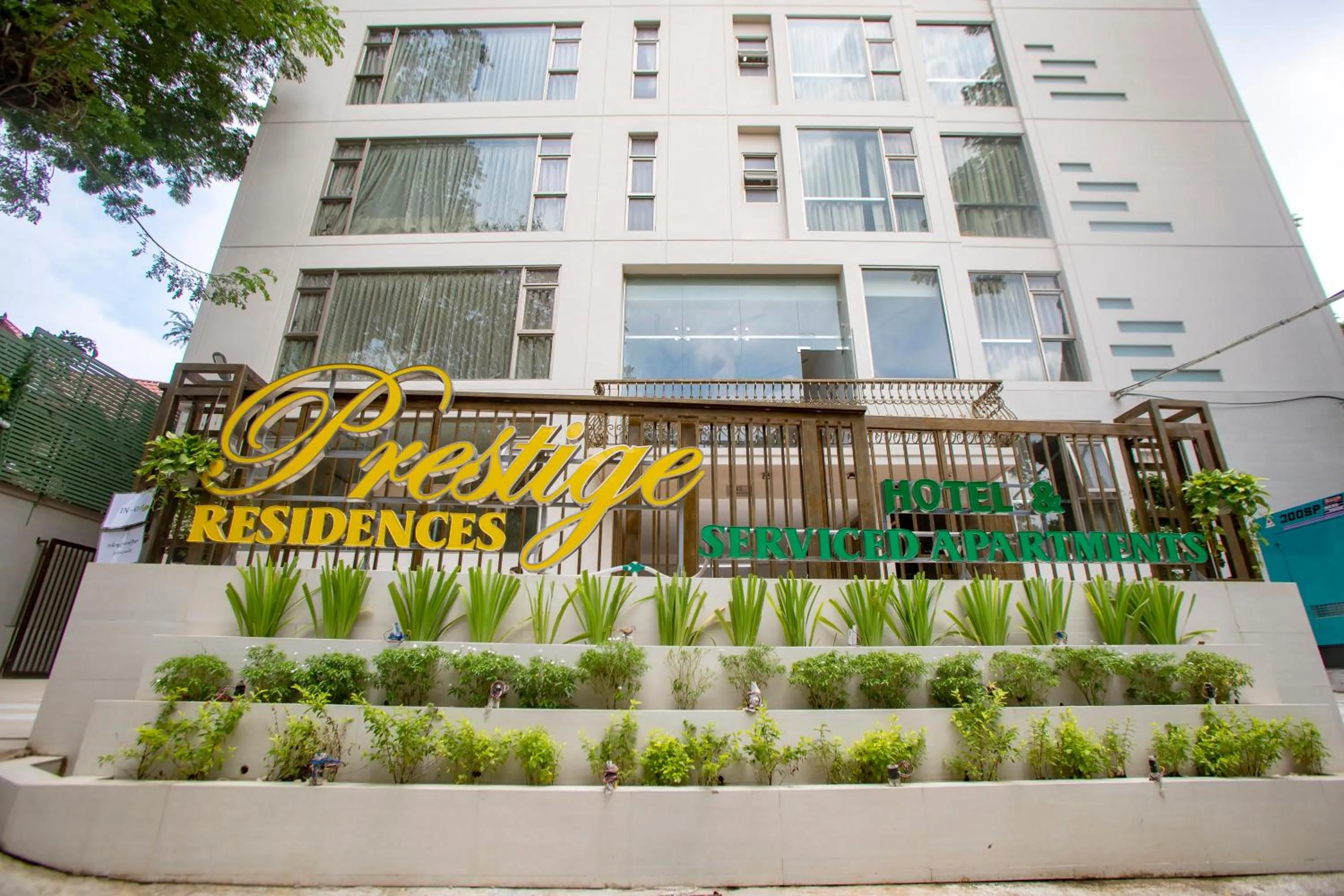 Property building in Prestige Residences at Golden Valley by Grand United Hospitality