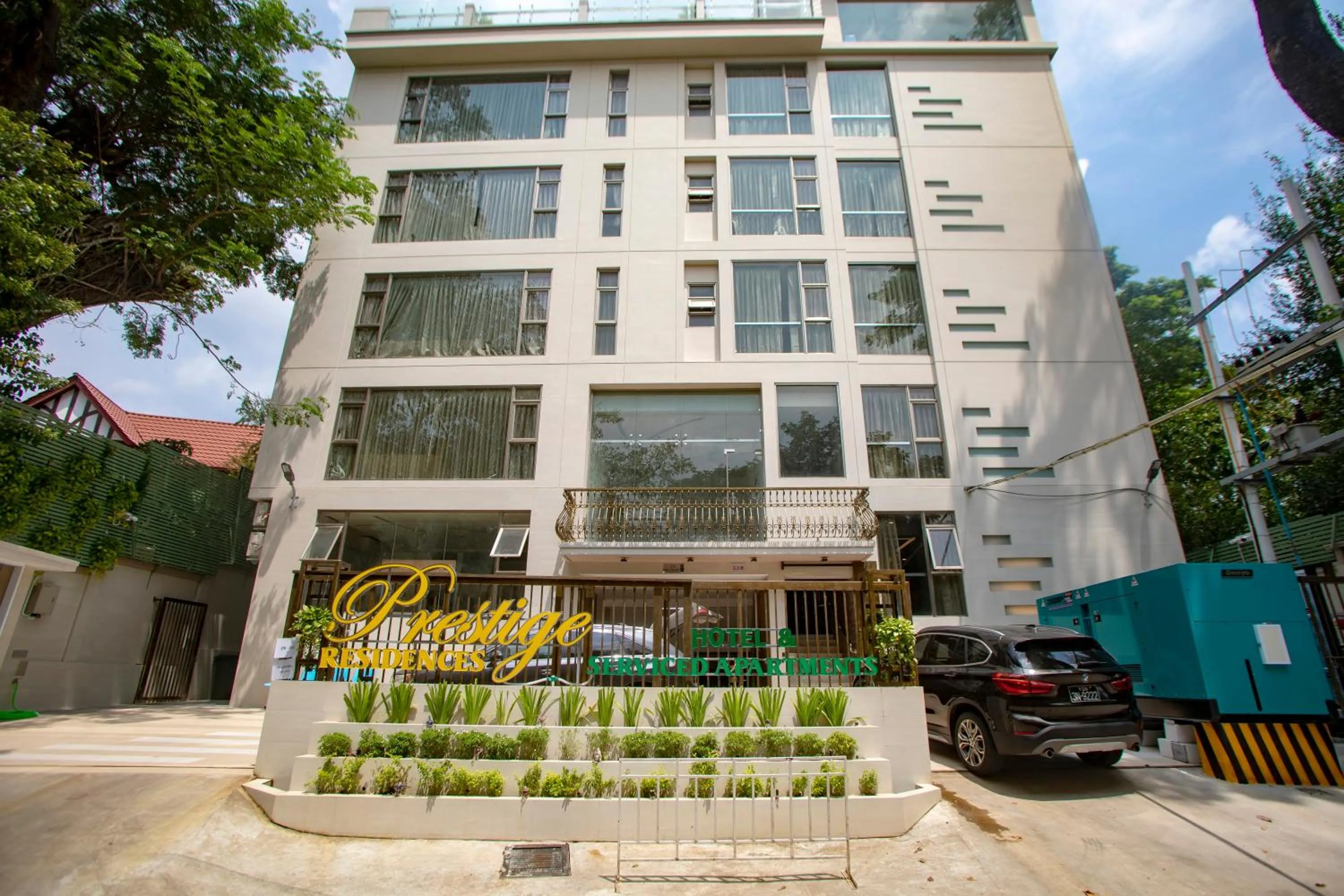 Property building in Prestige Residences at Golden Valley by Grand United Hospitality