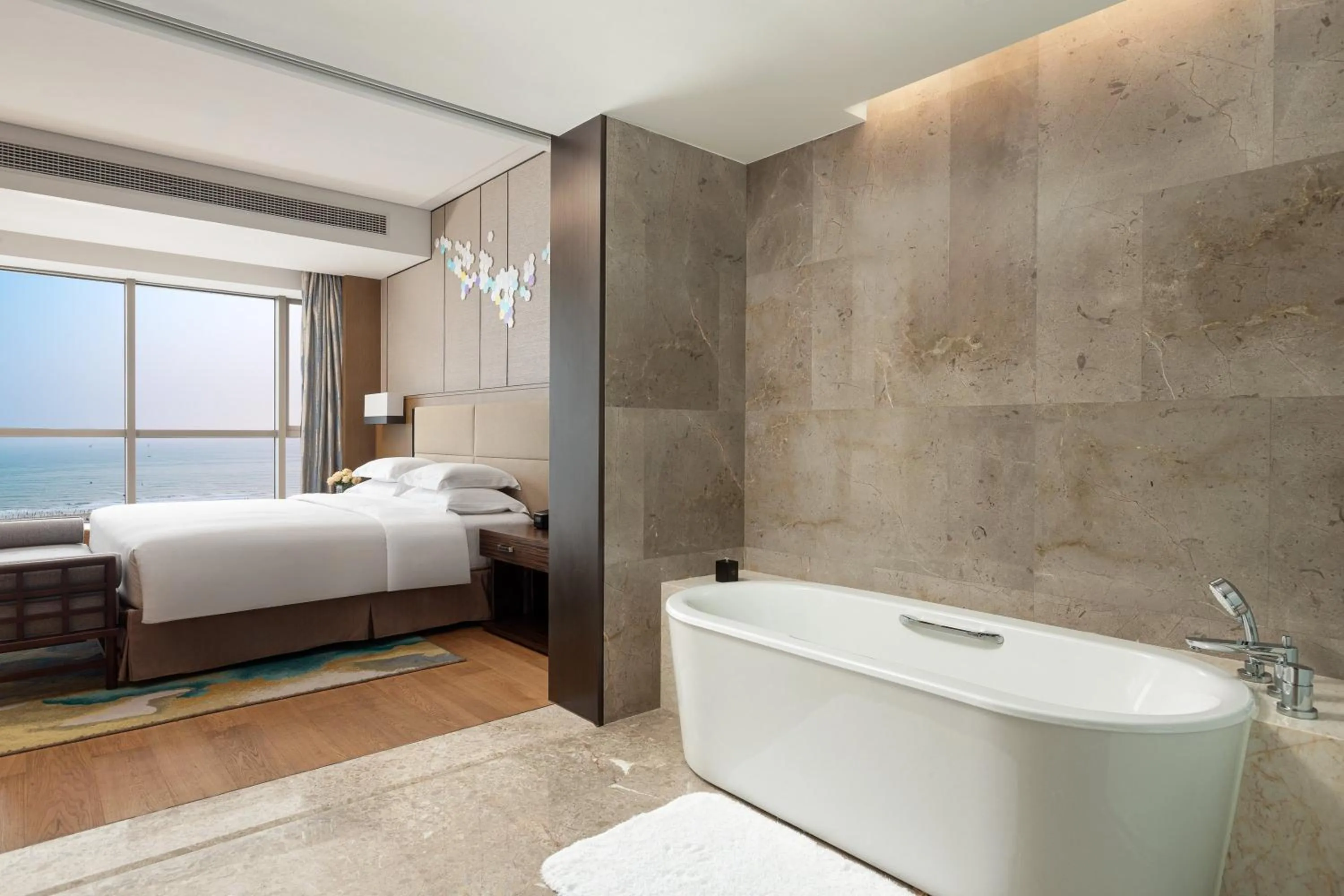 Photo of the whole room, Bed in Crowne Plaza Beihai Silver Beach by IHG