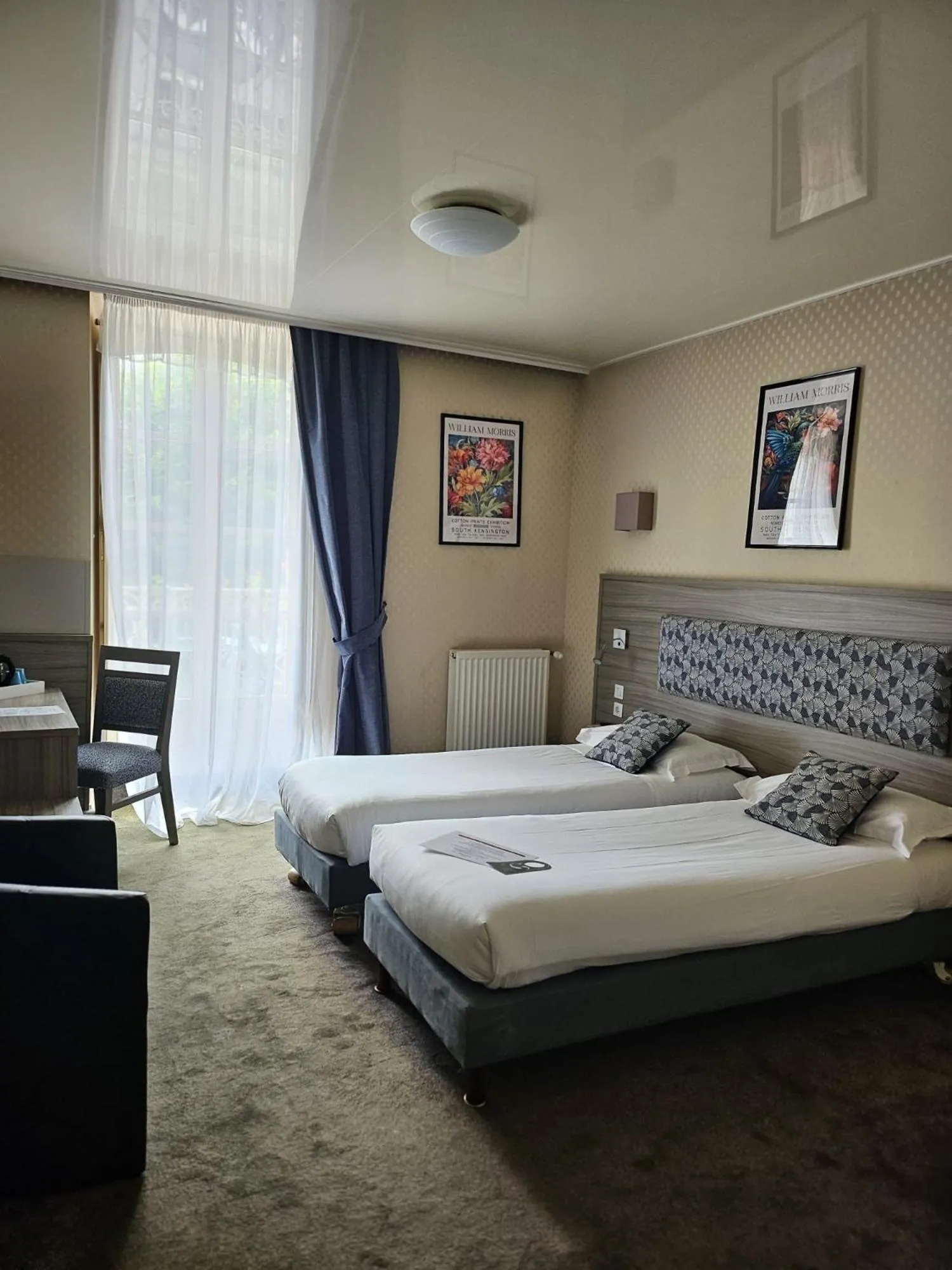 Photo of the whole room, Bed in Cit'Hotel le Challonge