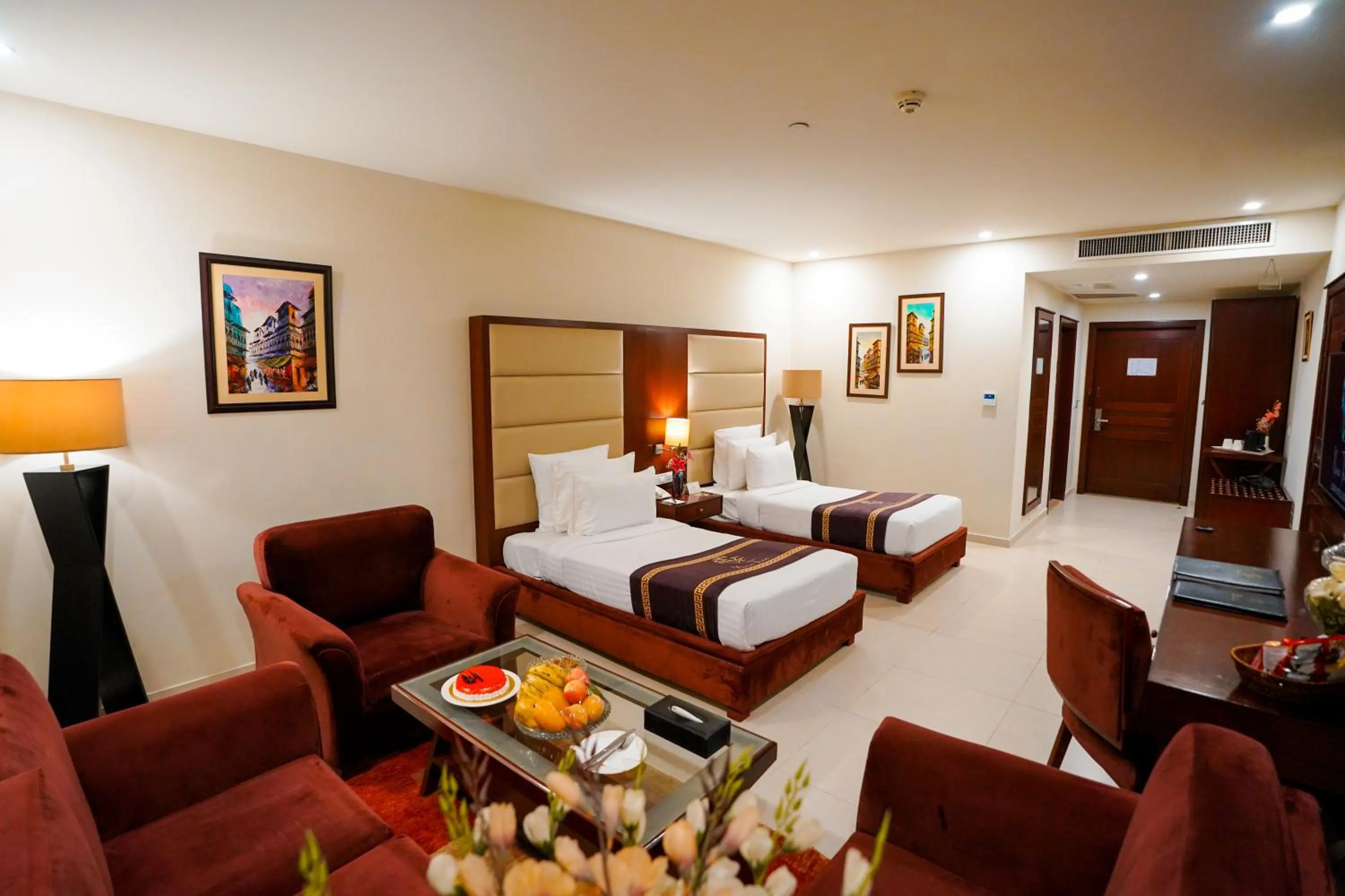 Photo of the whole room, Bed in Nine Tree Luxury Hotel & Suites Lahore