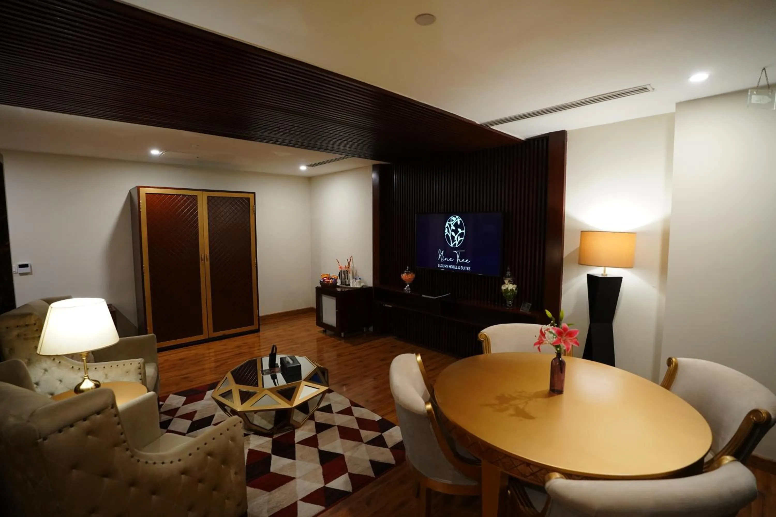 TV and multimedia in Nine Tree Luxury Hotel & Suites Lahore