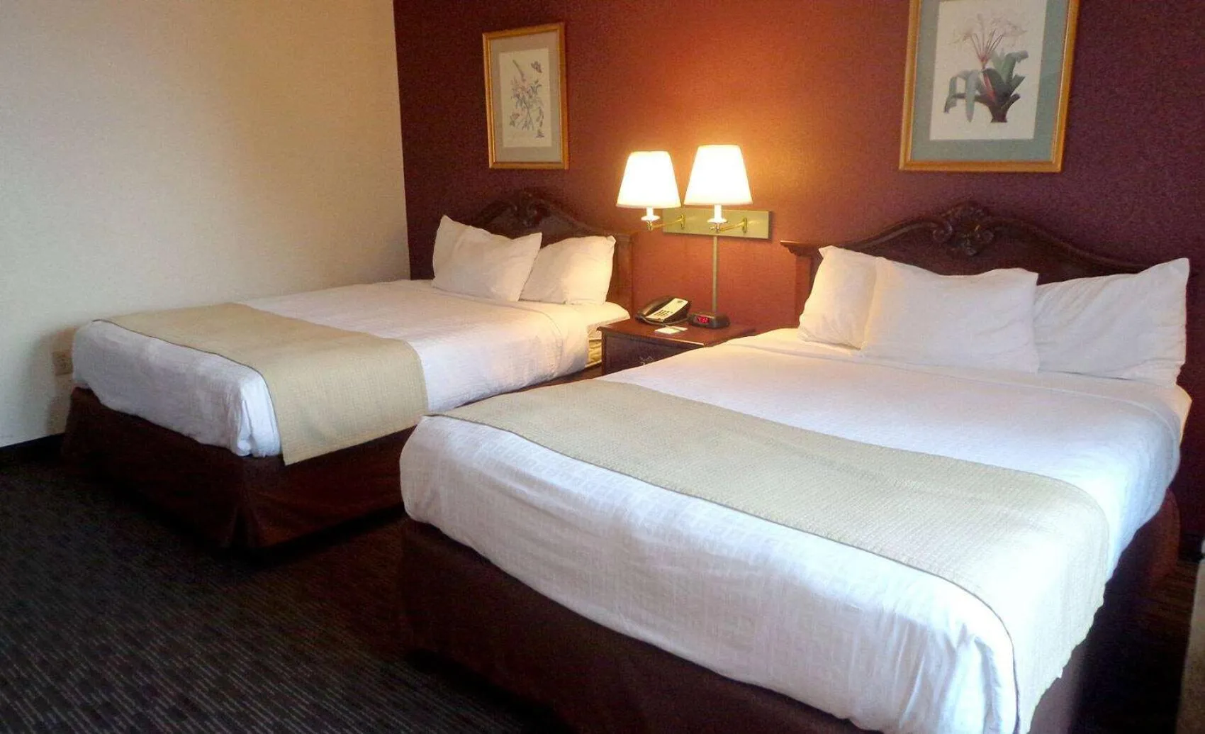 Bedroom, Bed in AmericInn by Wyndham Marshall