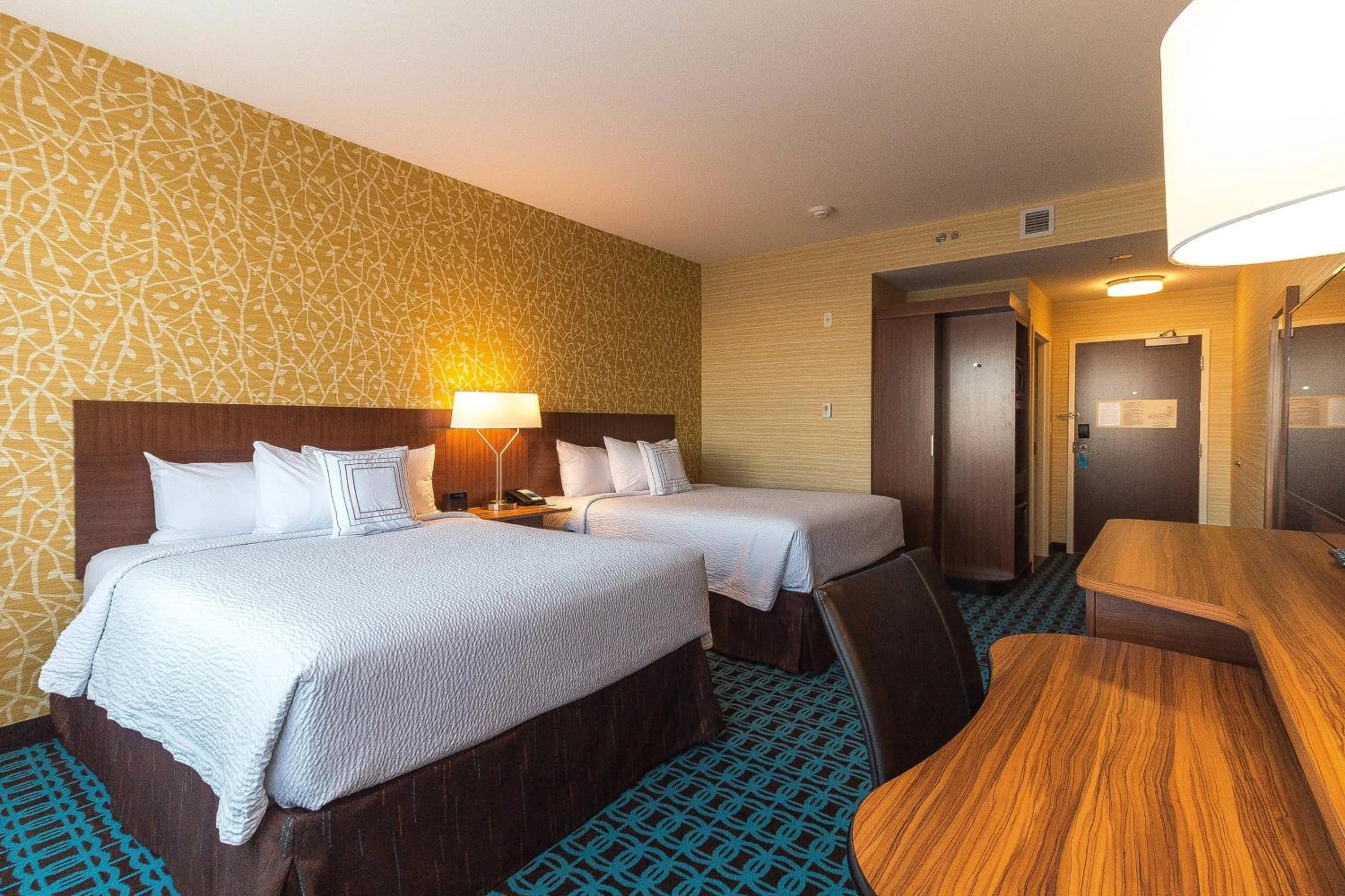 Photo of the whole room, Bed in Fairfield by Marriott Regina