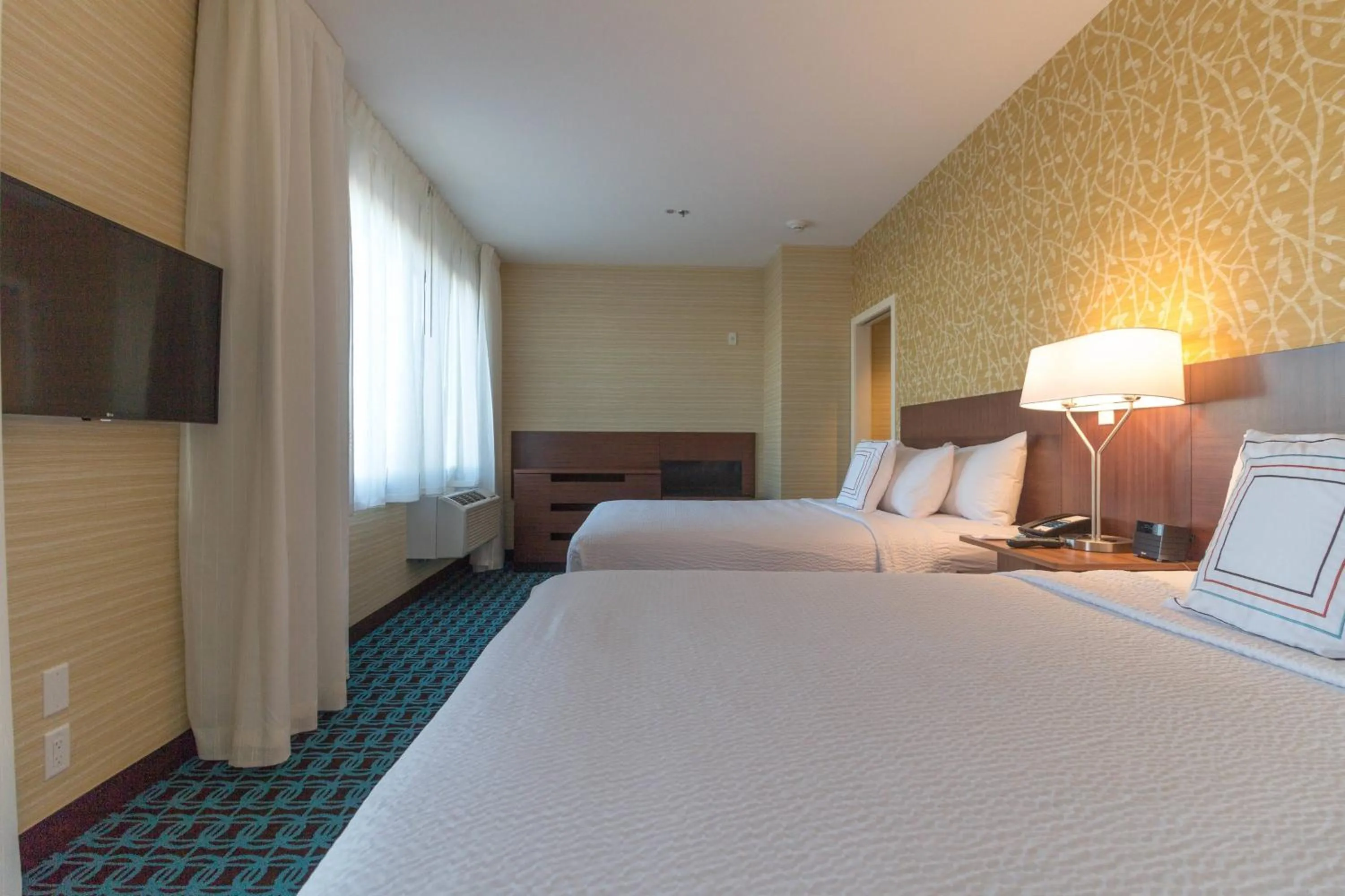 Bedroom, Bed in Fairfield by Marriott Regina