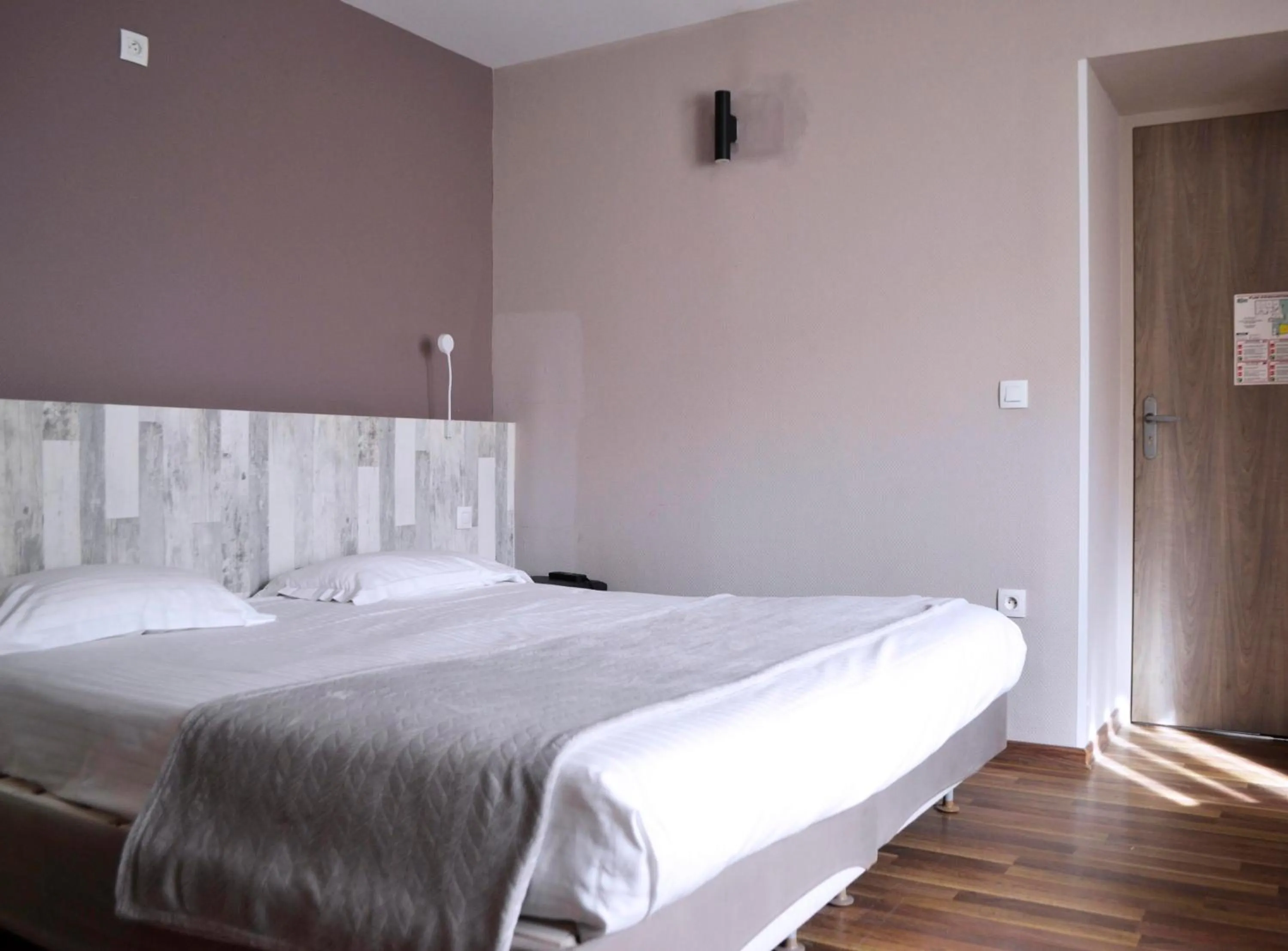 Bed in Brit Hotel Le Surcouf