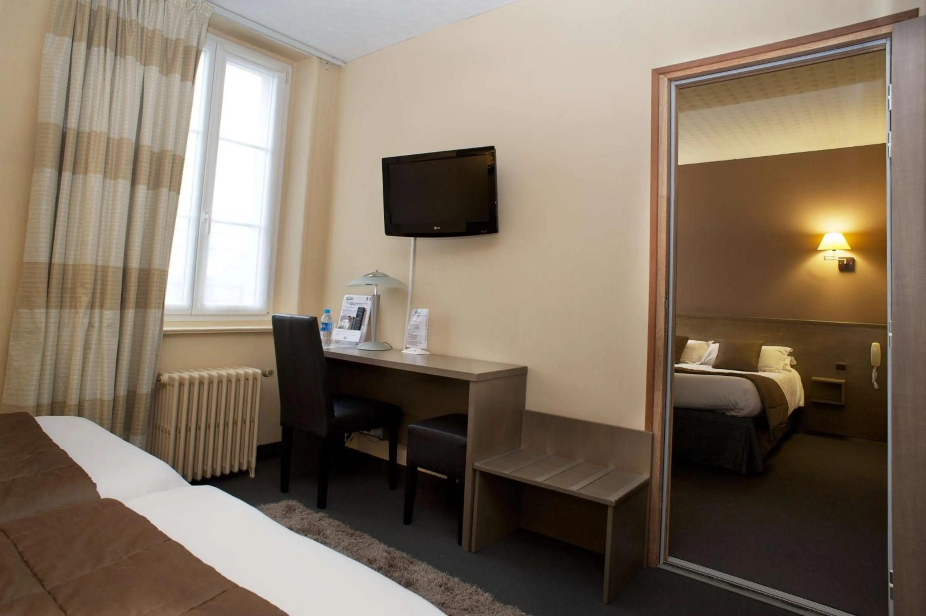 Bedroom, Bed in Brit Hotel Le Surcouf