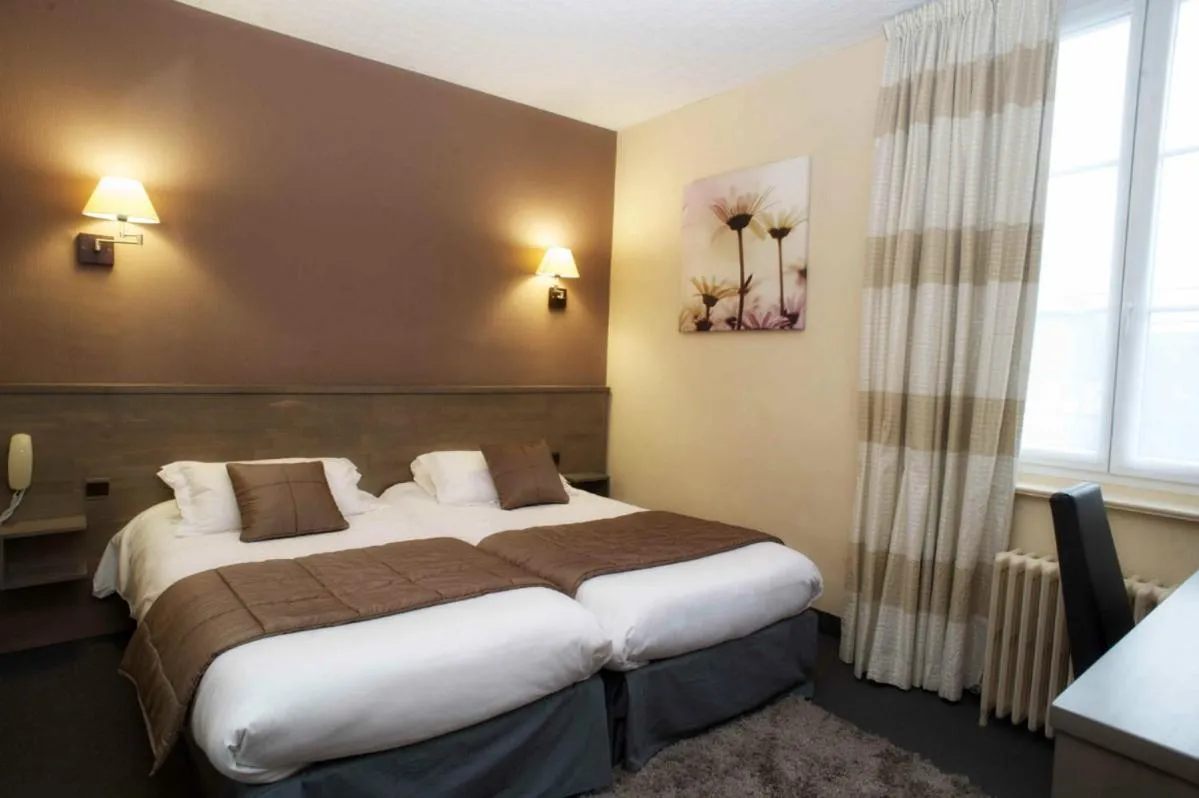 Bed in Brit Hotel Le Surcouf