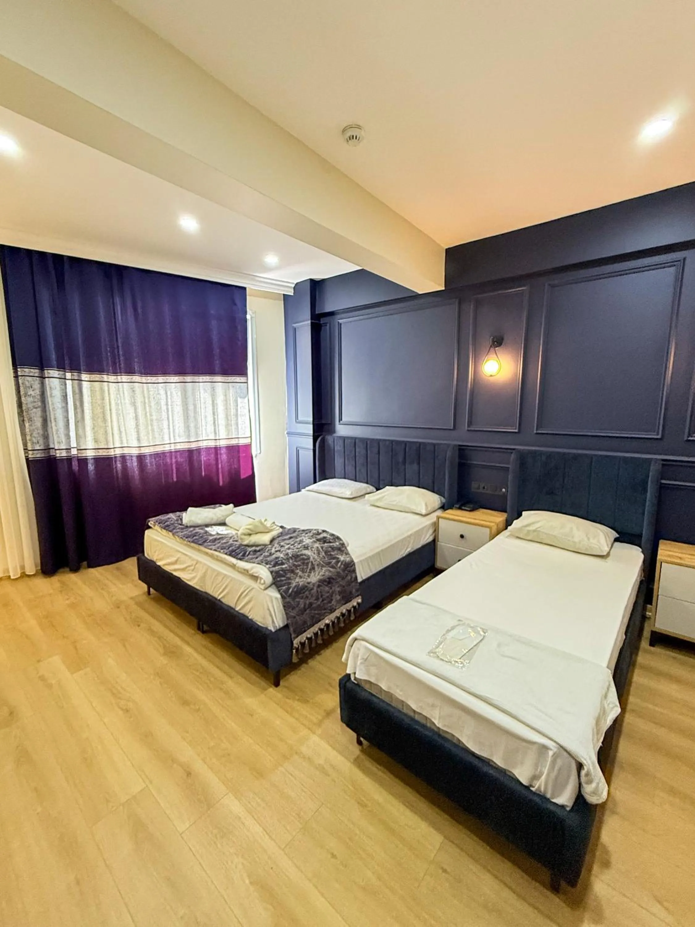 Bed in The Reina Hotel