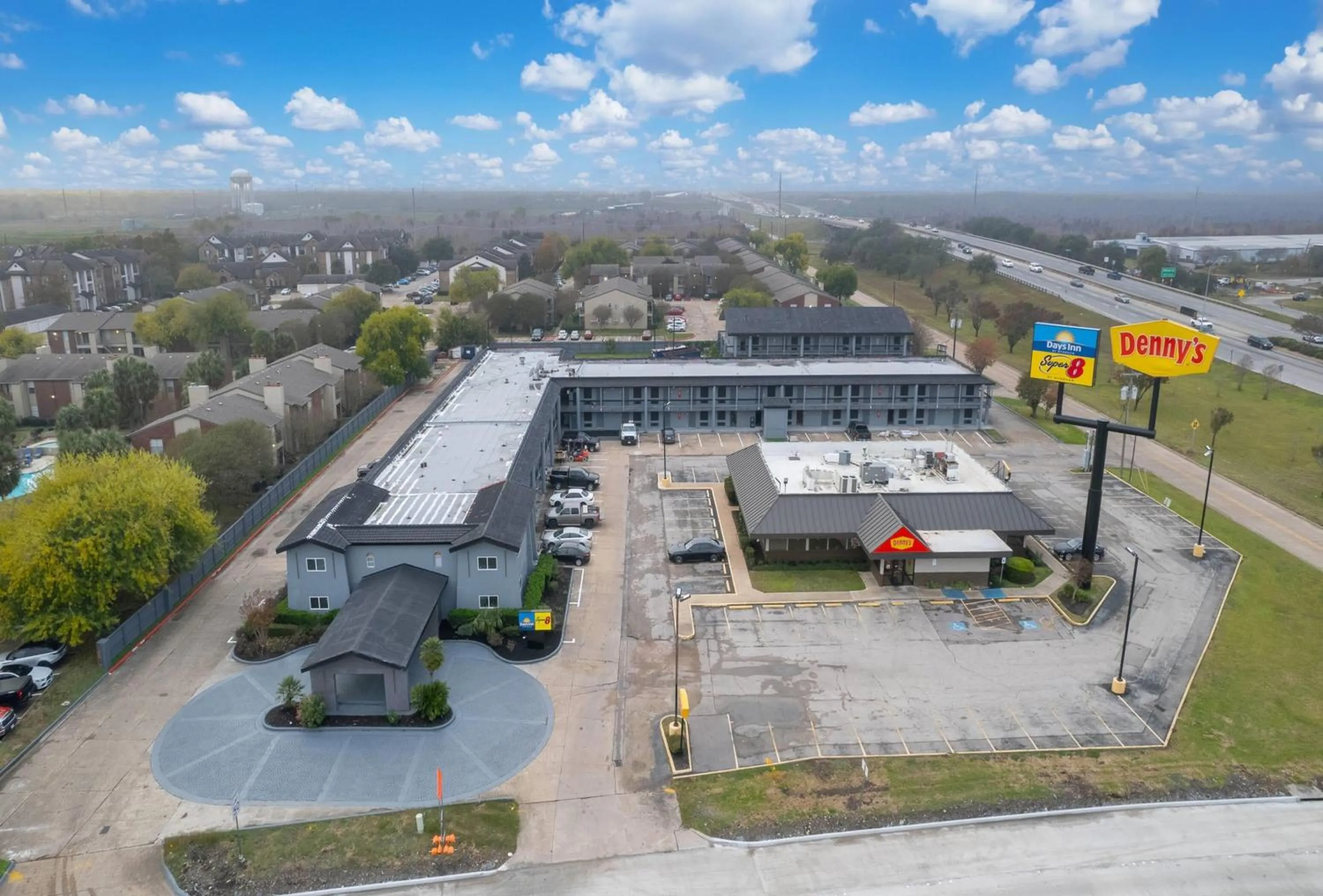 Property building in Days Inn & Suites by Wyndham Texas City