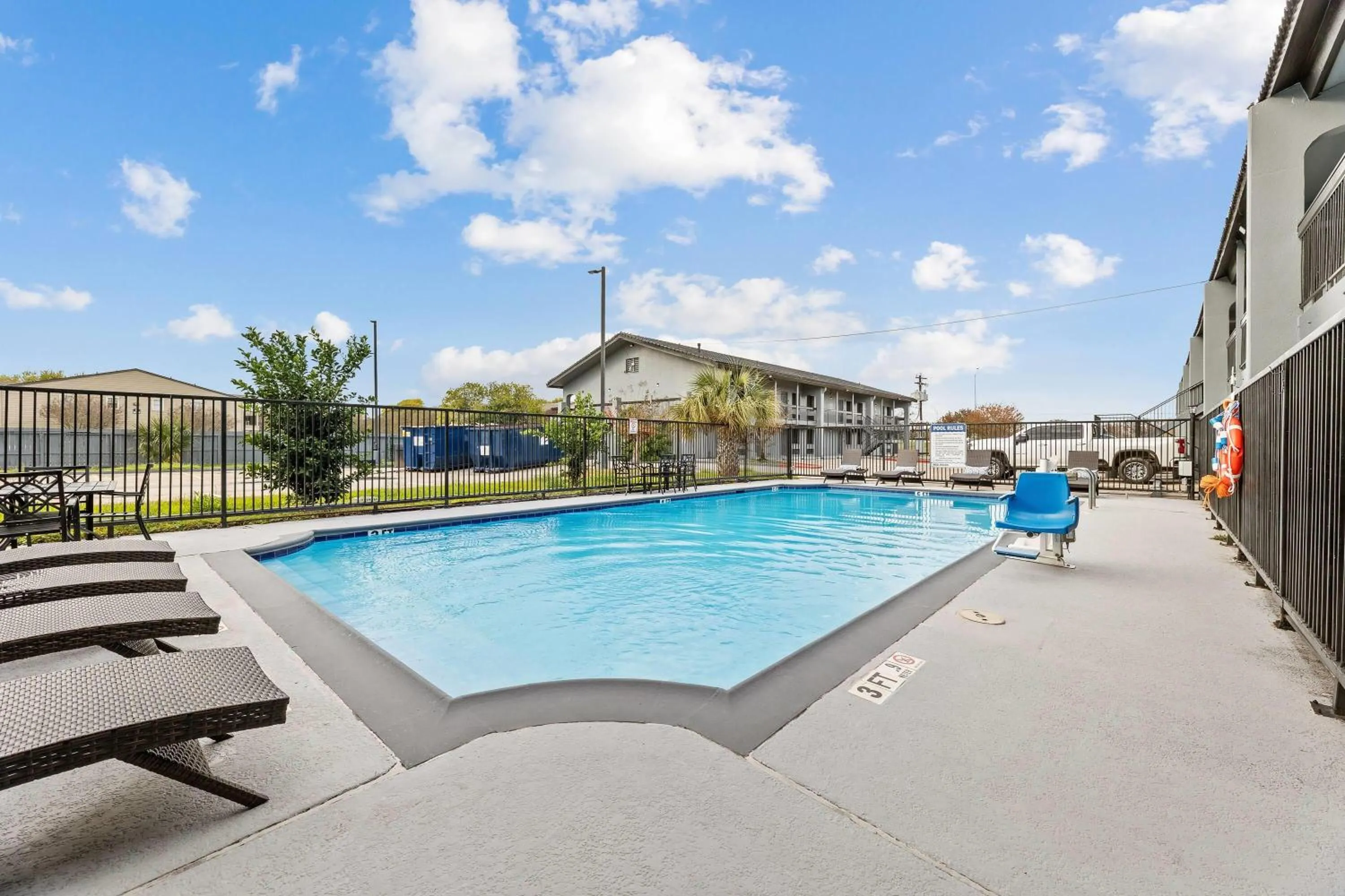 Pool view in Days Inn & Suites by Wyndham Texas City
