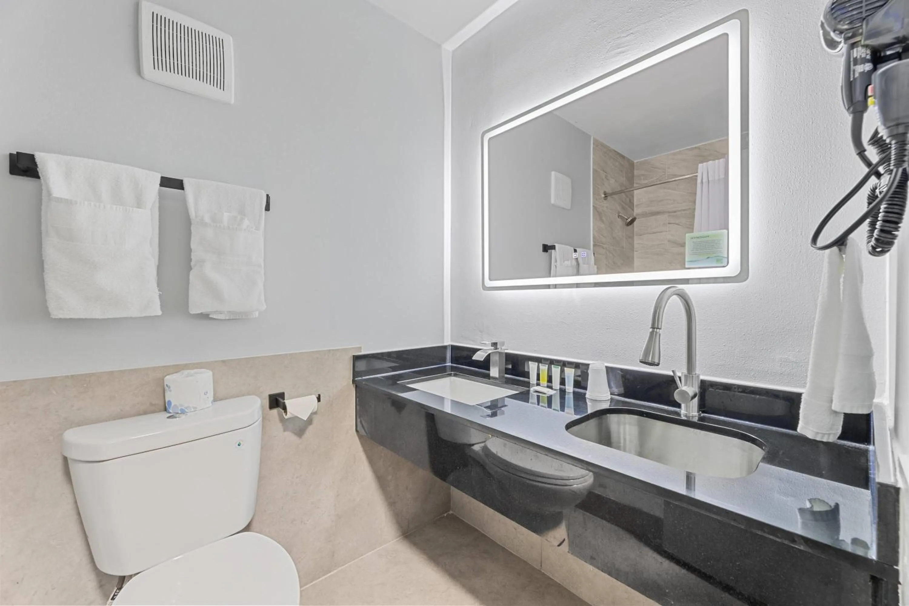 Bathroom in Days Inn & Suites by Wyndham Texas City