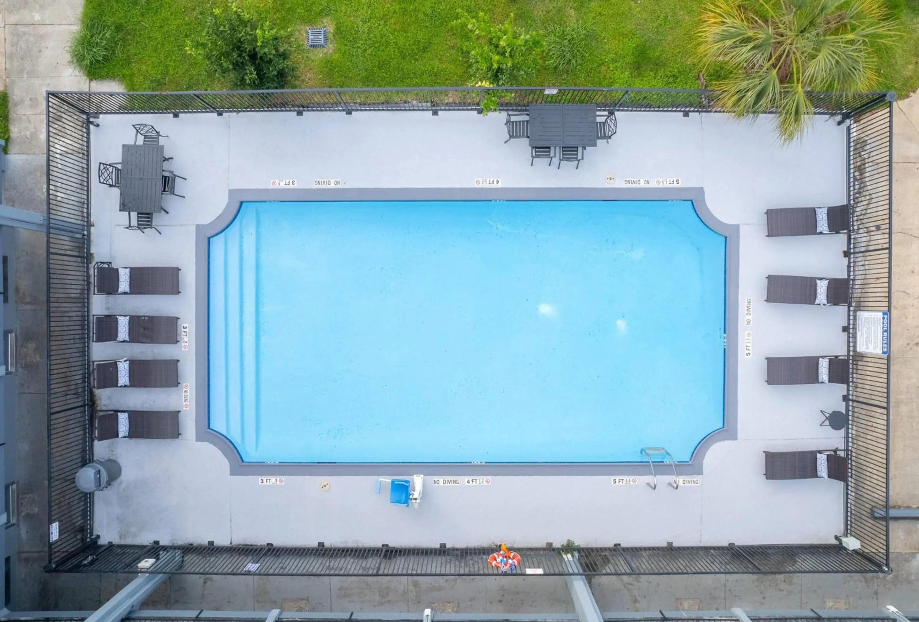 Pool view in Days Inn & Suites by Wyndham Texas City