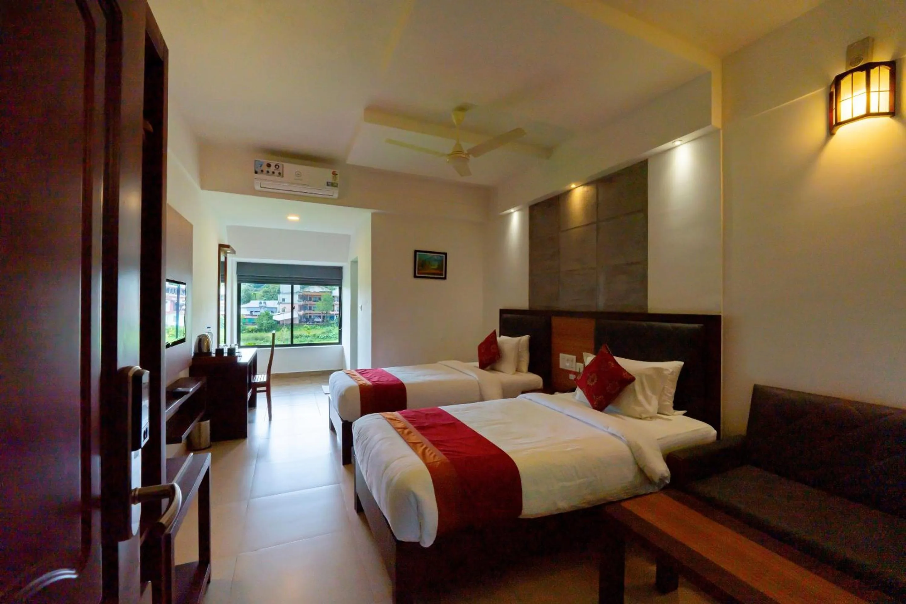 Bed in The Sanihara Hotel & Resort