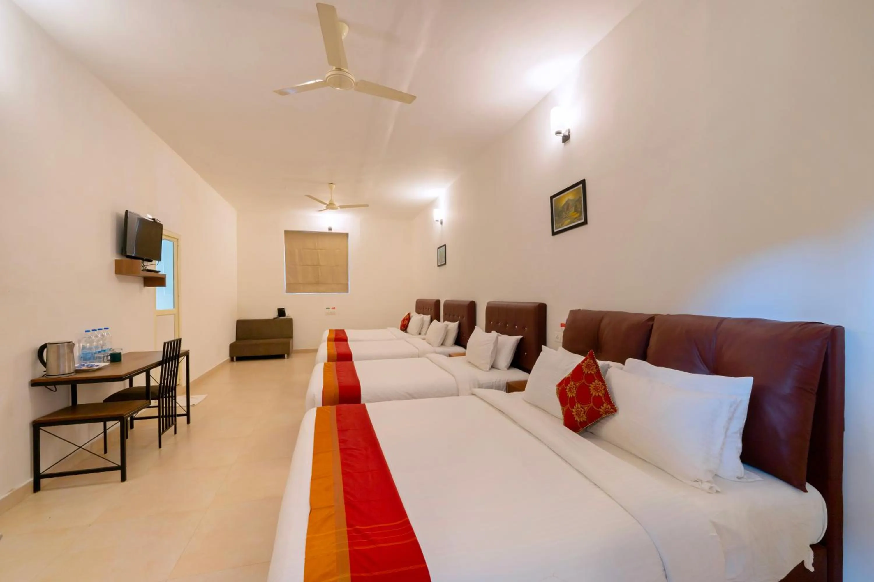 Bed in The Sanihara Hotel & Resort