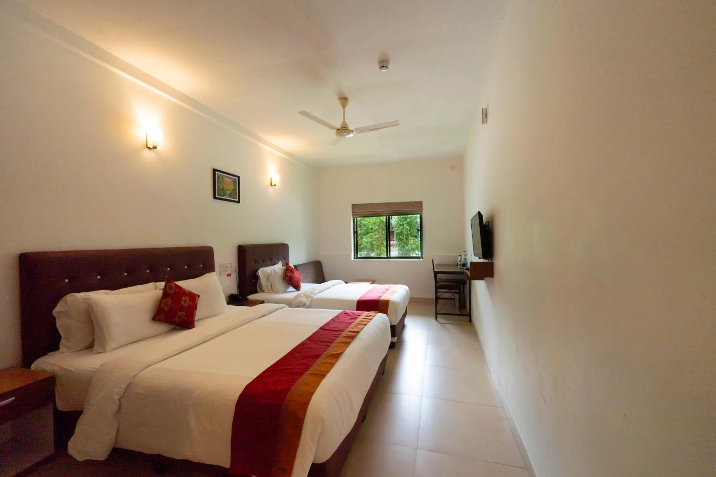 Bed in The Sanihara Hotel & Resort