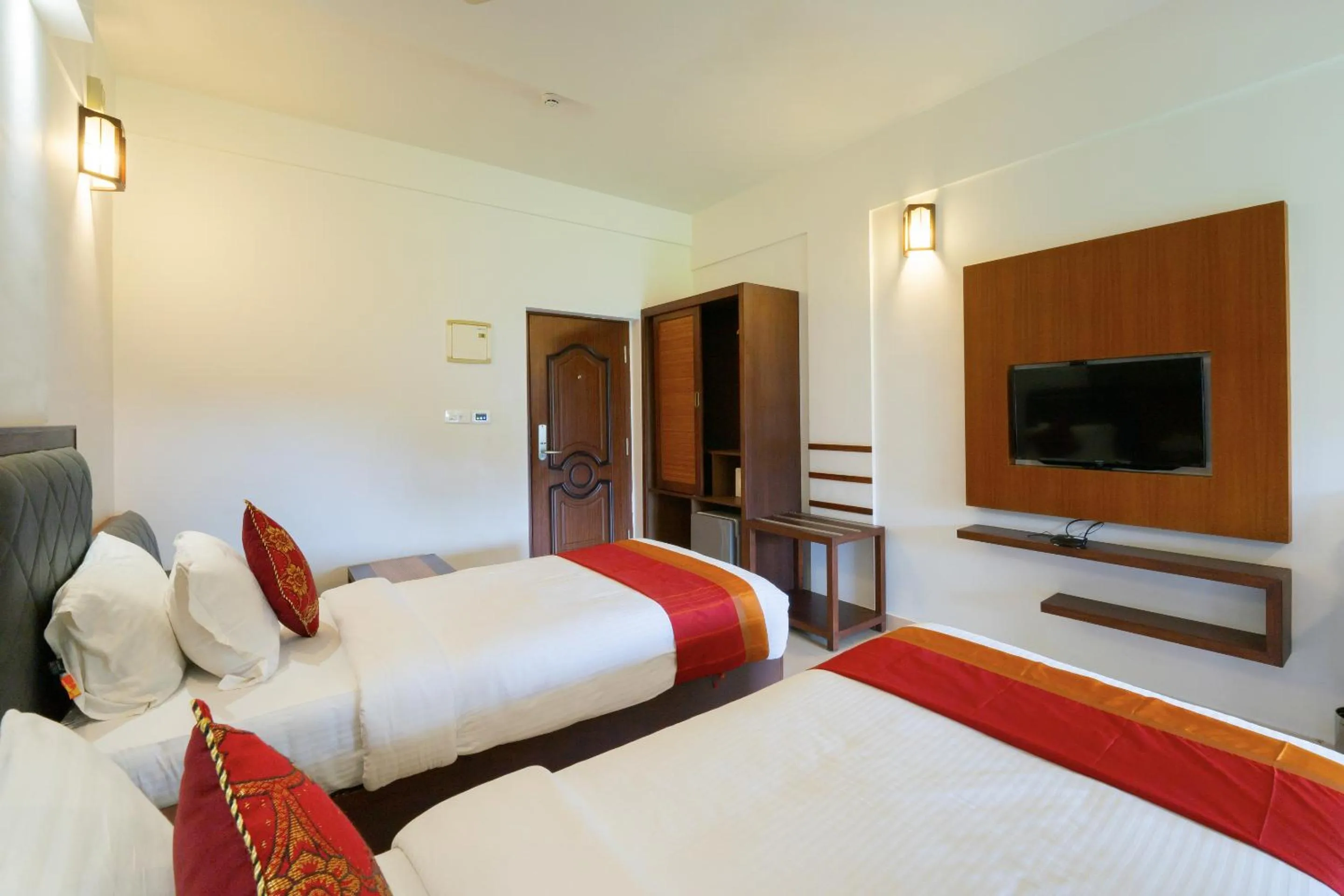 Bed in The Sanihara Hotel & Resort