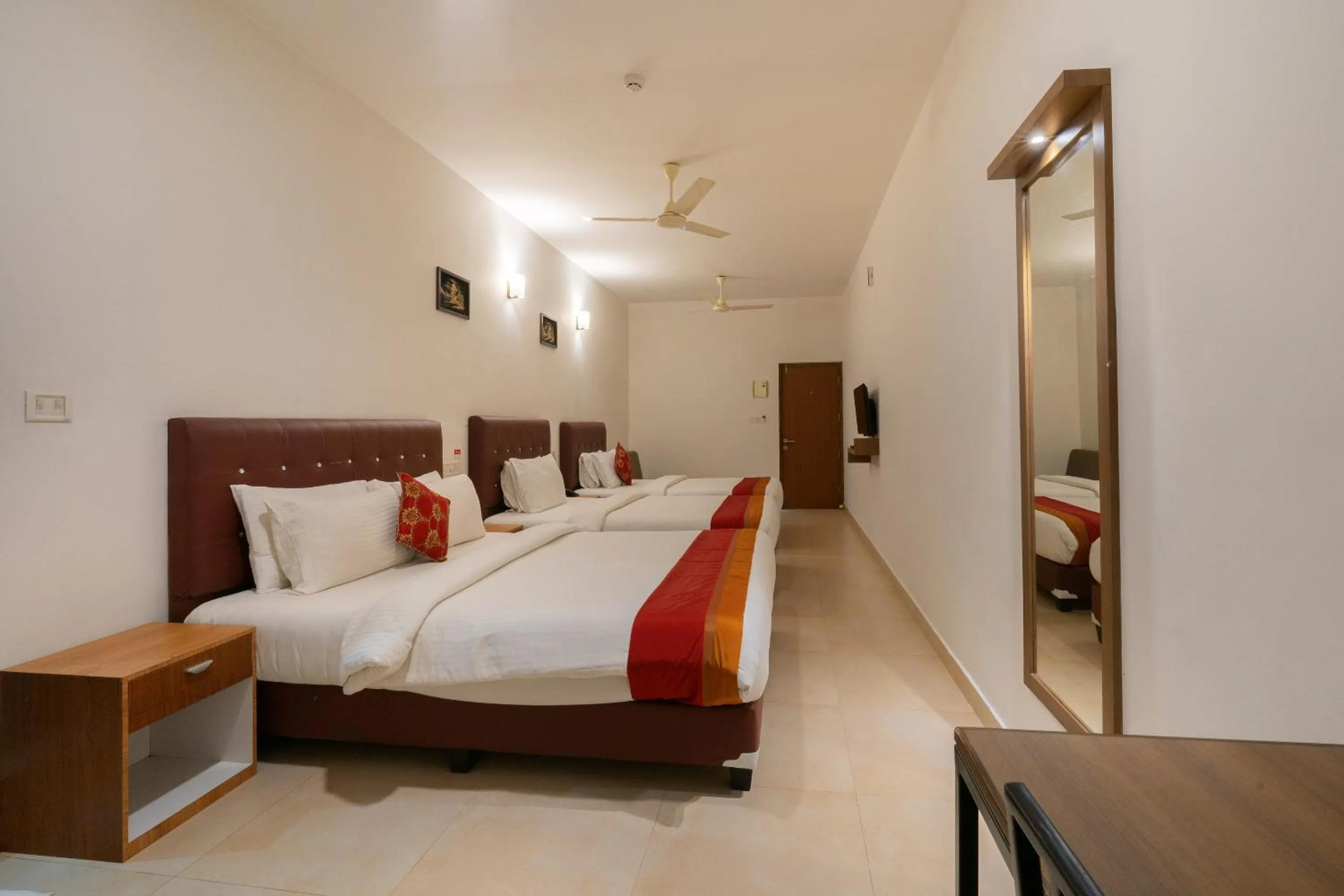 Bed in The Sanihara Hotel & Resort