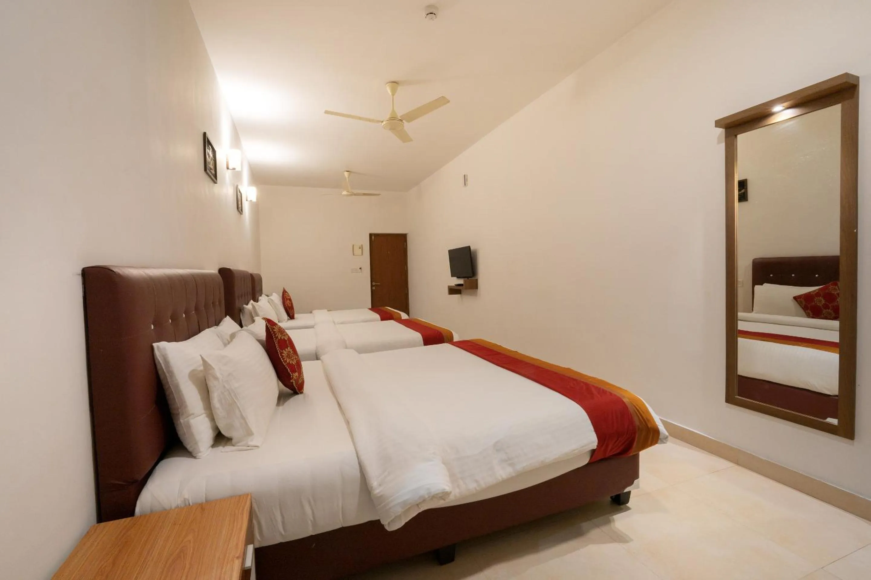 Bed in The Sanihara Hotel & Resort