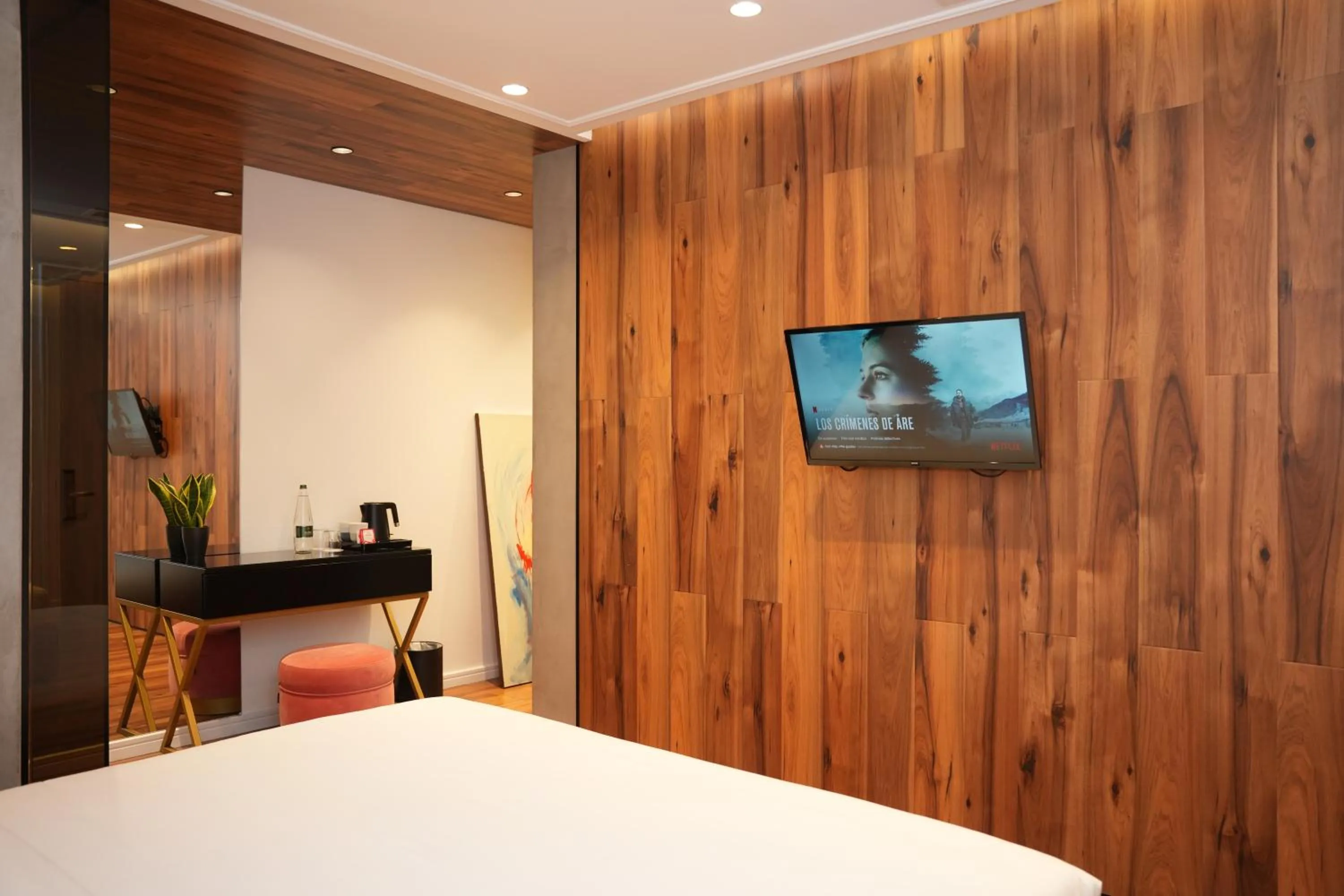 Bed in La Suite Boutique Hotel