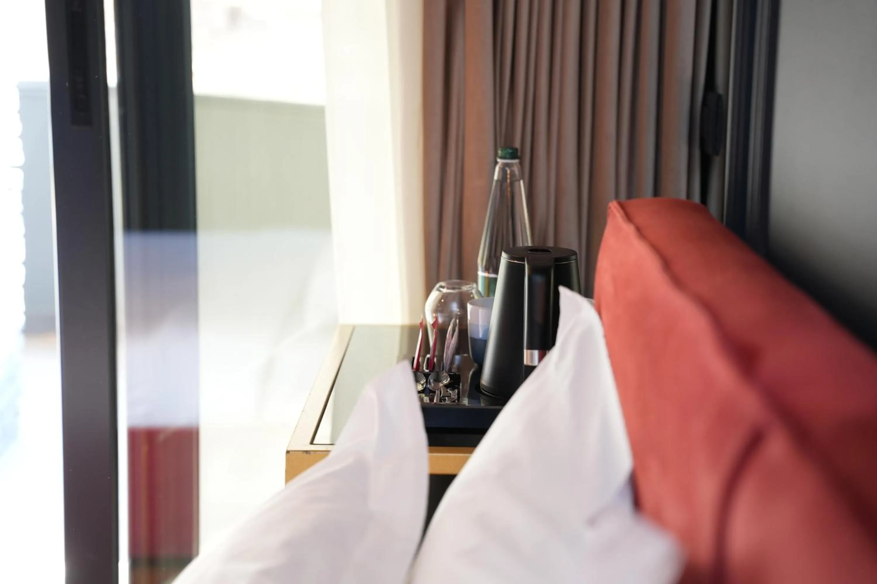 Bed in La Suite Boutique Hotel