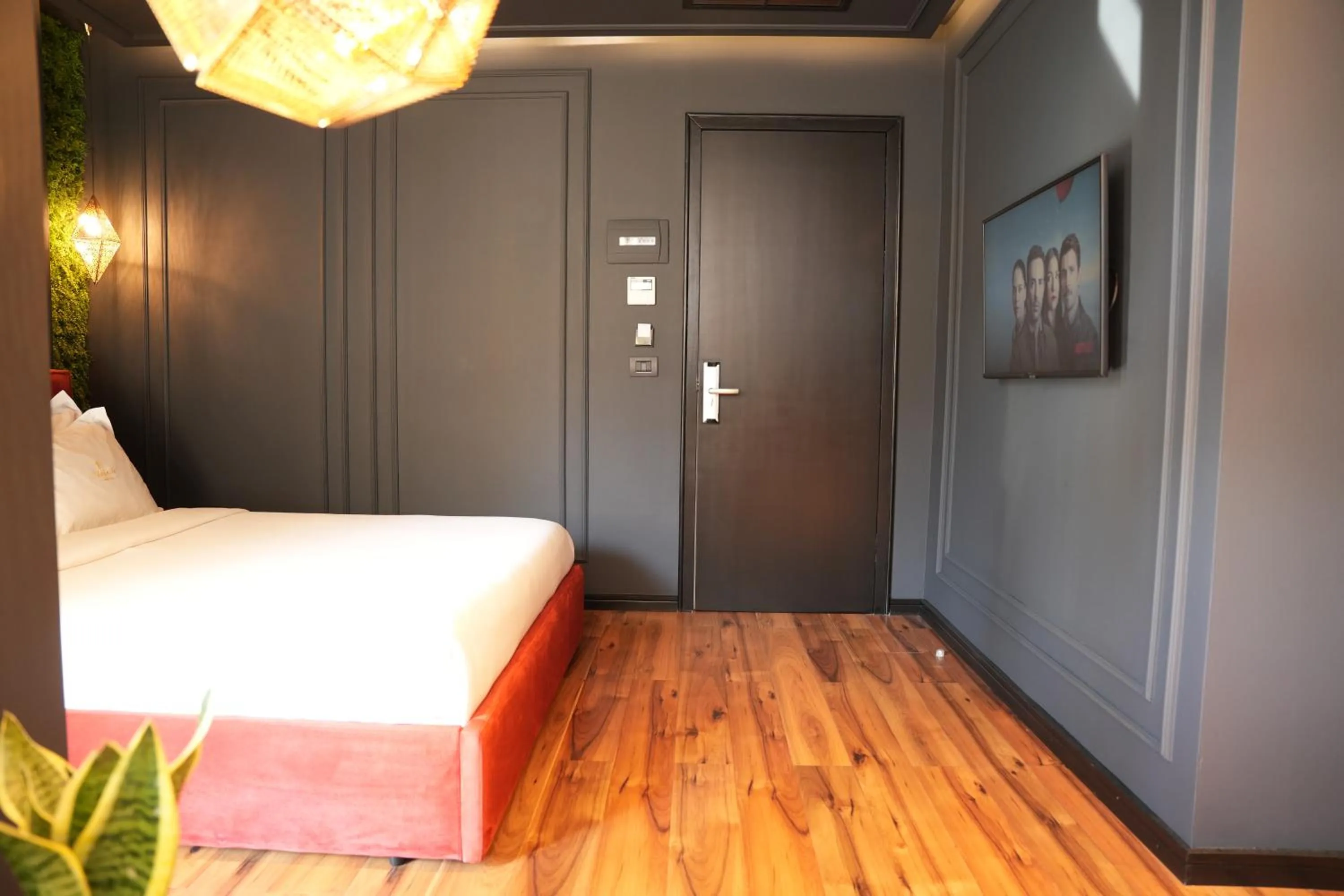 Bed in La Suite Boutique Hotel