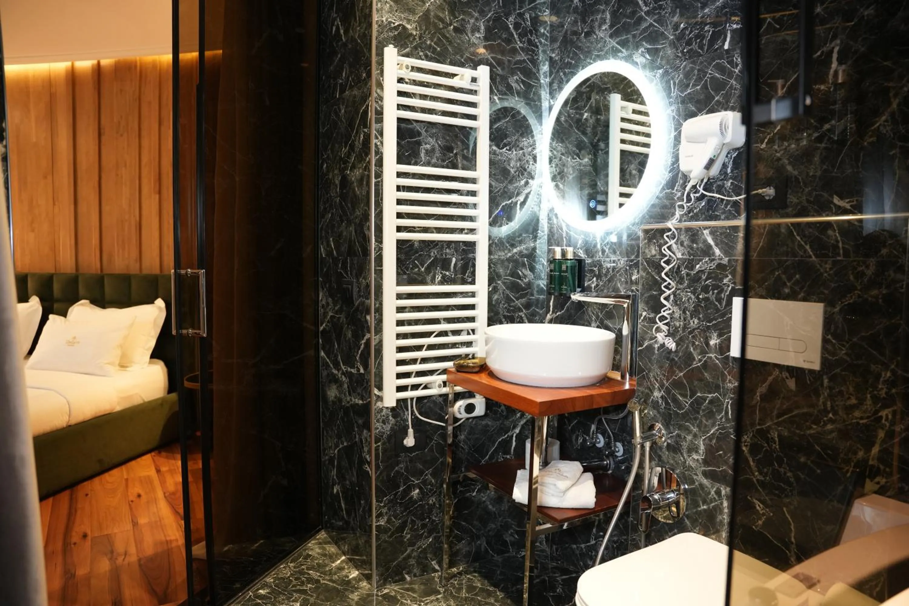 Bathroom, Bed in La Suite Boutique Hotel