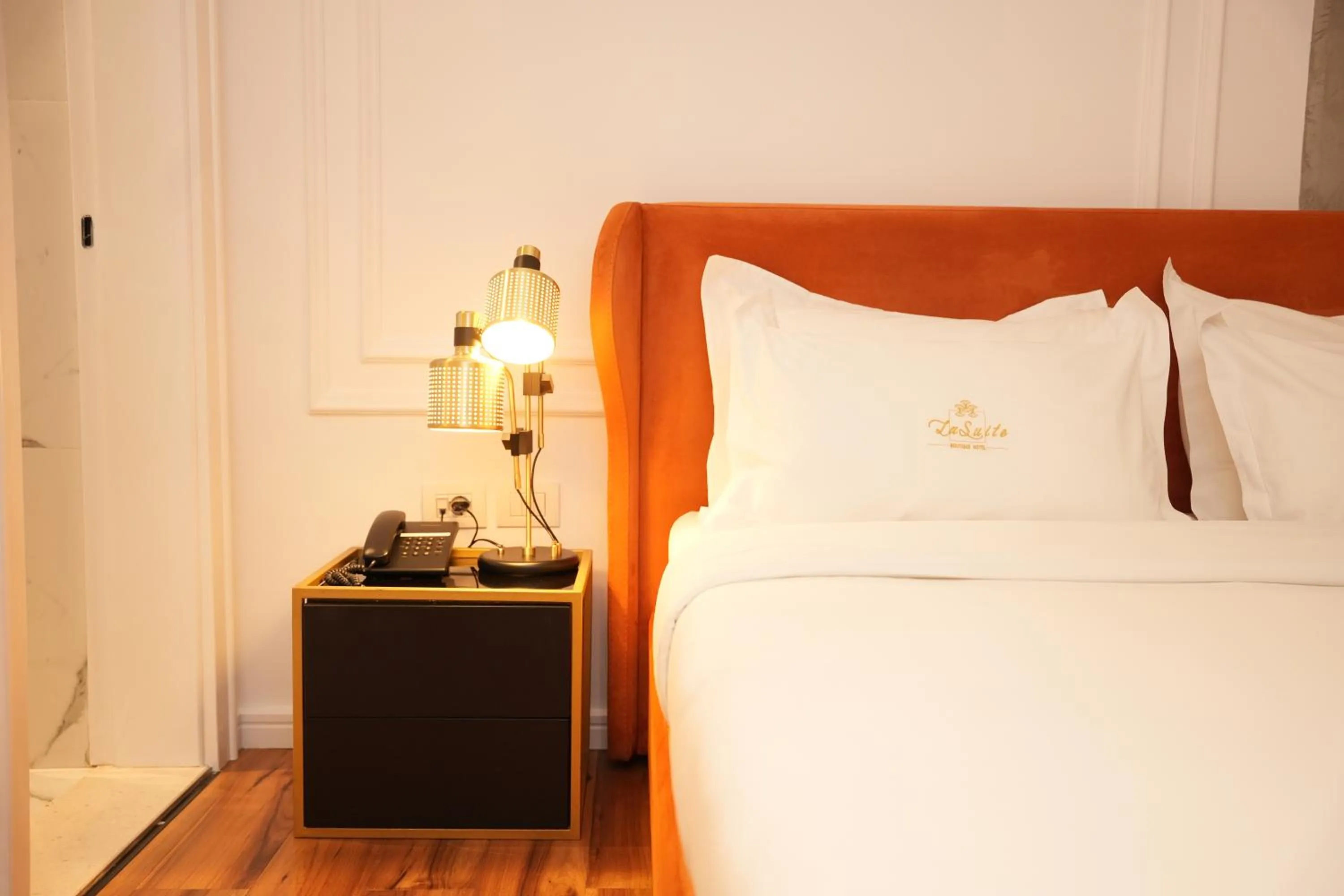 Bed in La Suite Boutique Hotel